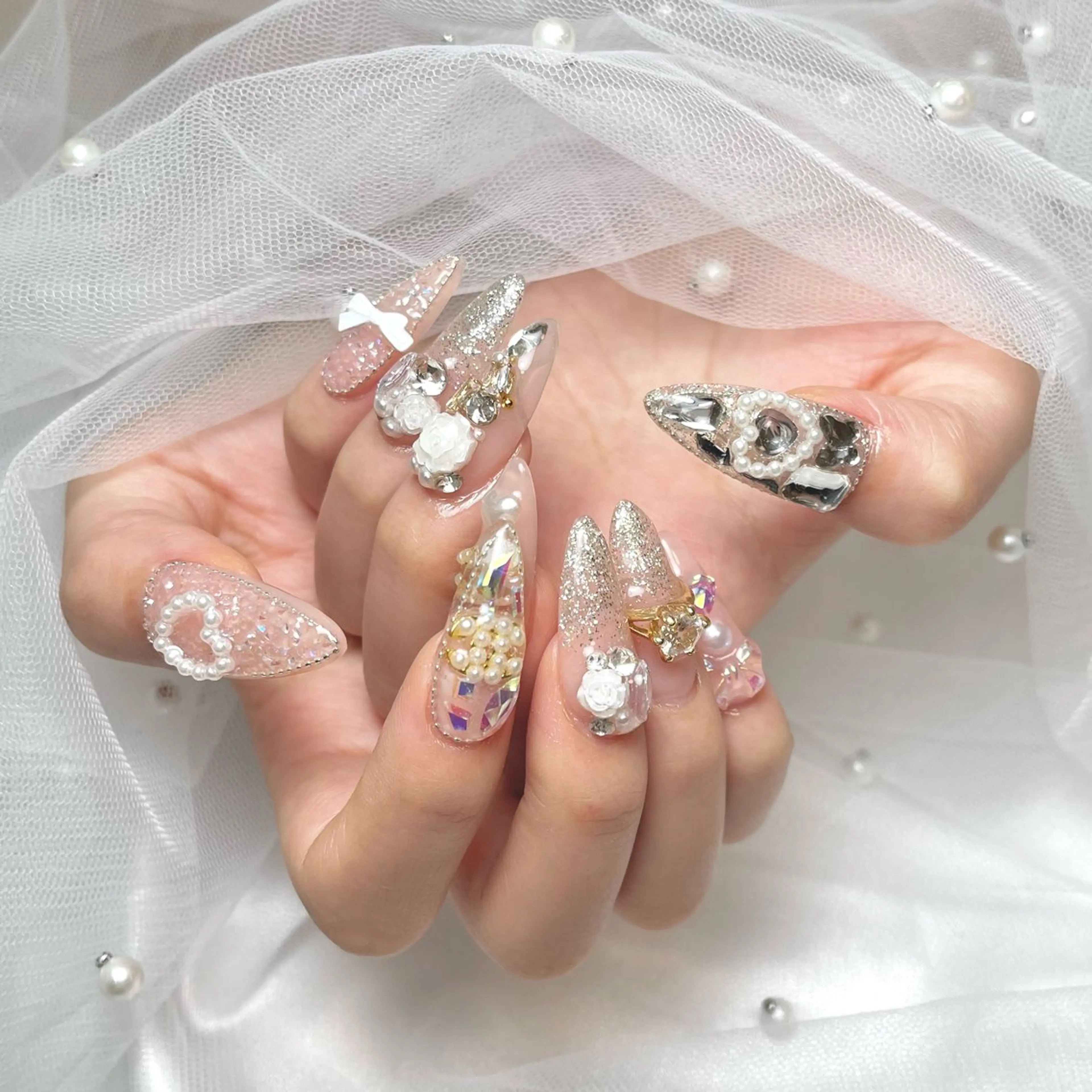 ネイル キラキラネイル ロングネイル ワンホンネイル ハンドネイル COCO  NAIL所属・COCO NAILのネイルデザイン