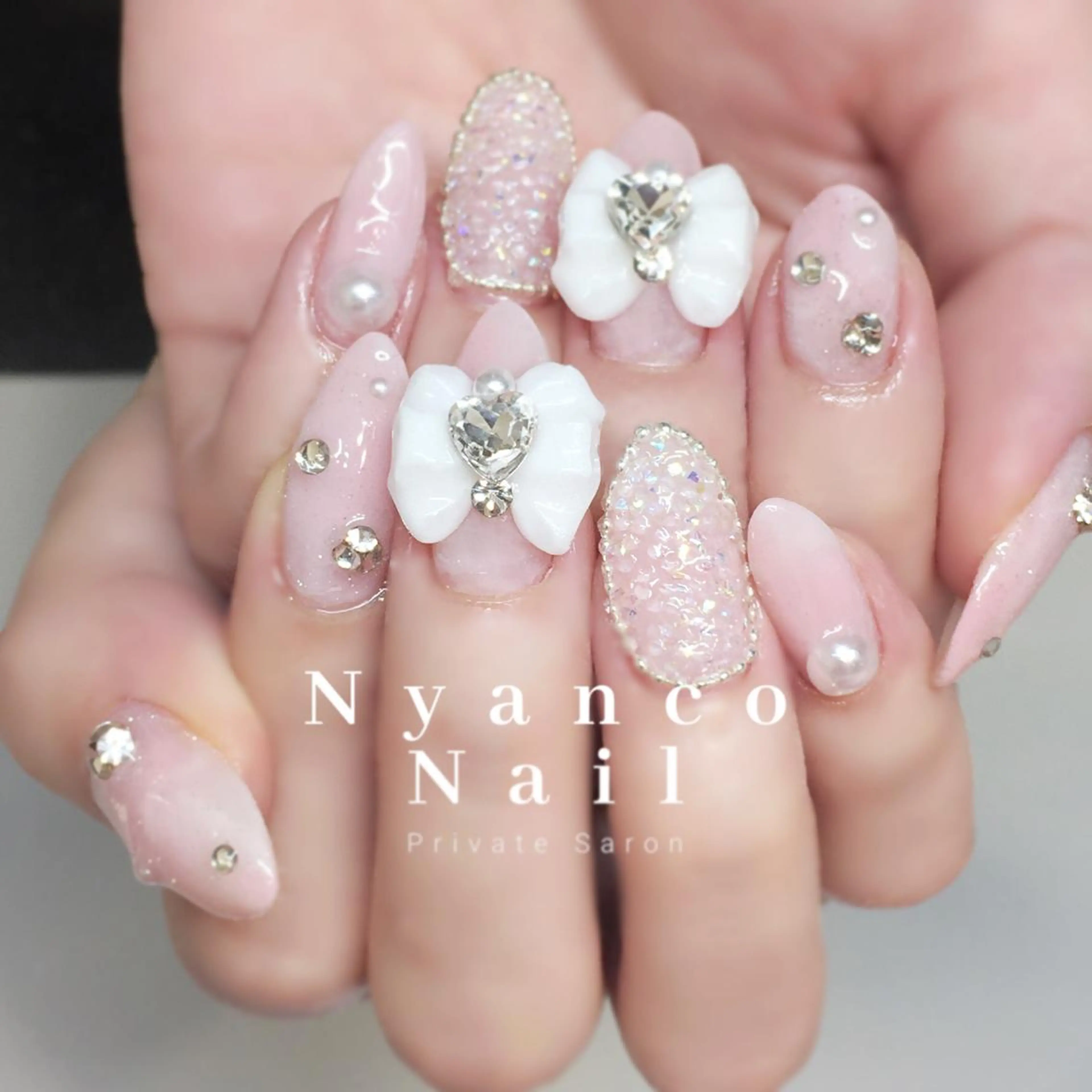 ネイル ジェルネイル キラキラネイル ピンク リボン 夏ネイル Nyanco Nailのネイルデザイン