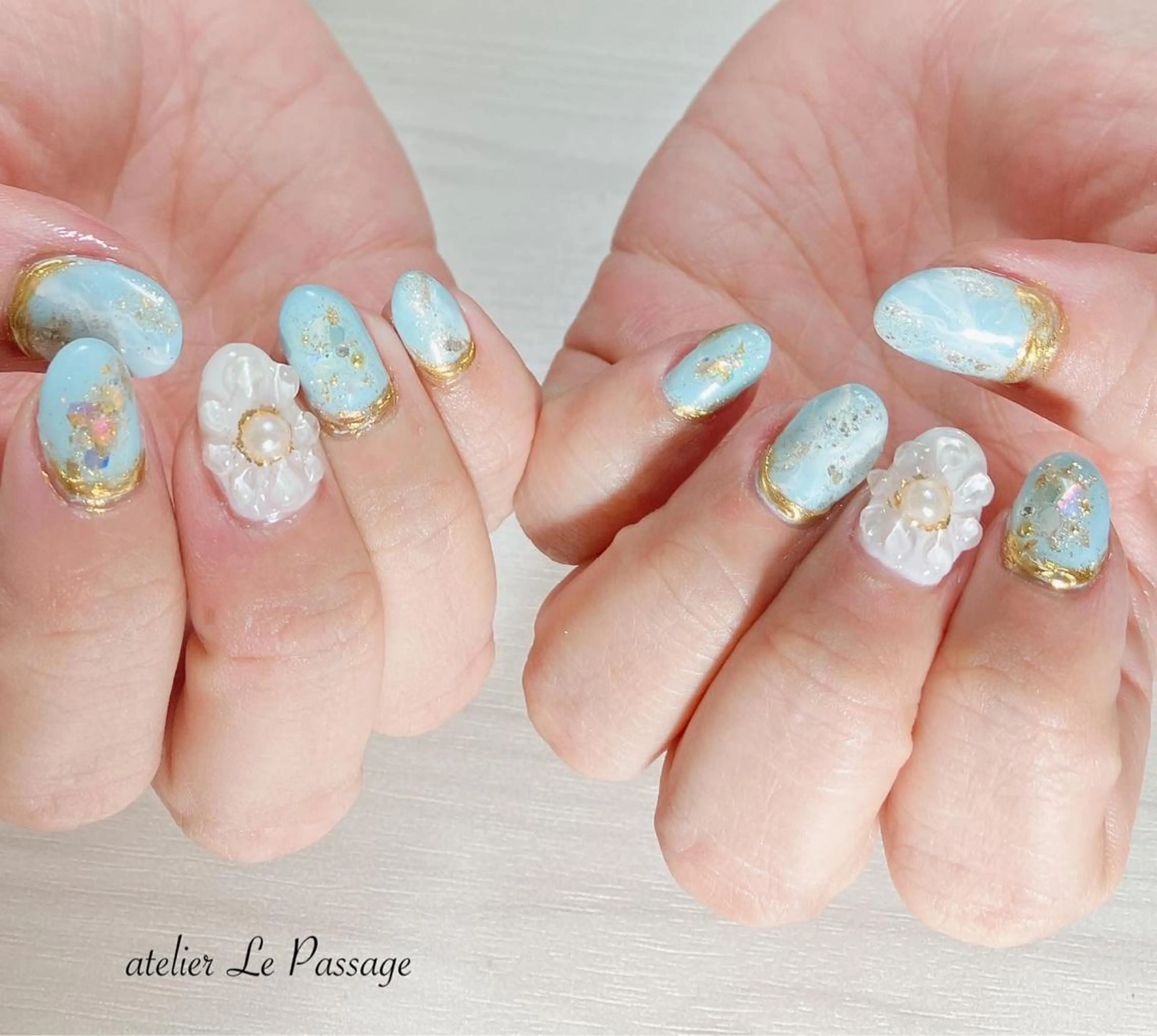 ネイル フラワーネイル ジェルネイル ラメ(グリッター) 水色 パラジェル Atelier Le Passage所属・h nakatsukaのネイルデザイン