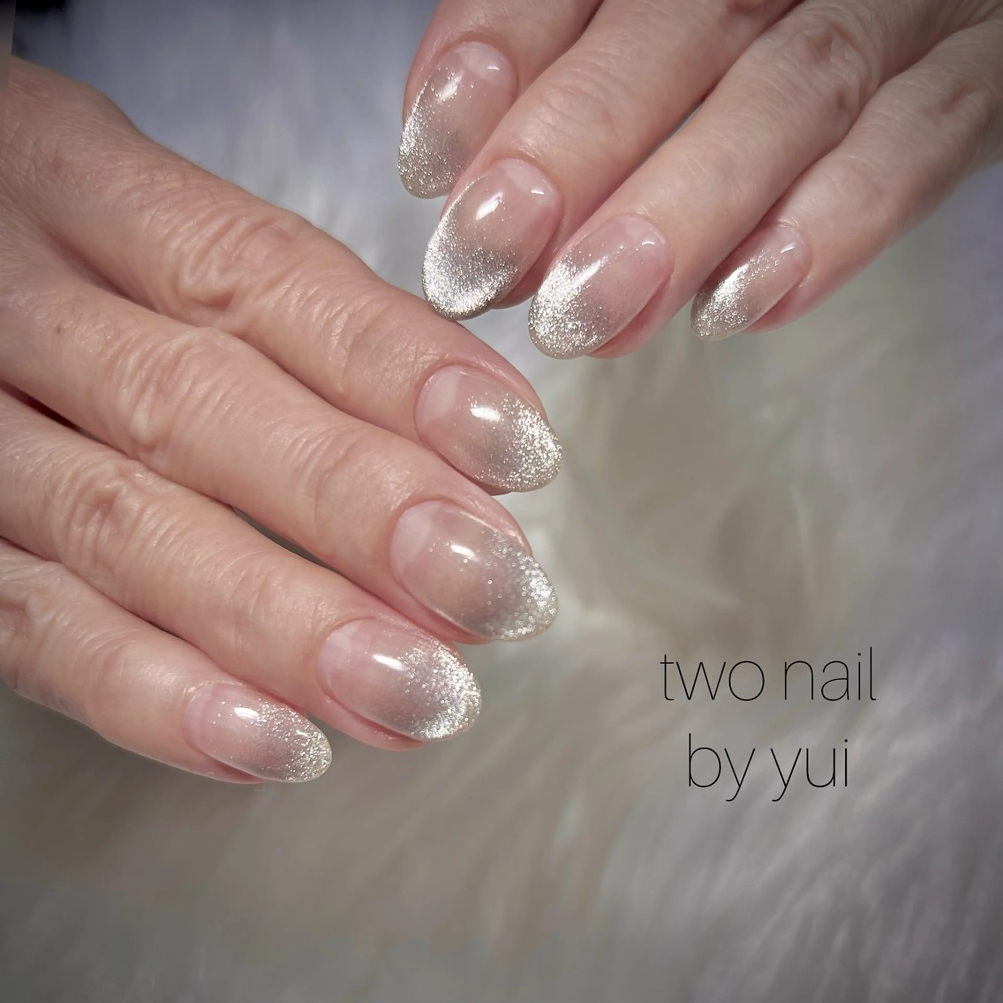 ネイル キラキラネイル マグネットネイル ネイルチップ ホワイト ハンドネイル two nailのネイルデザイン