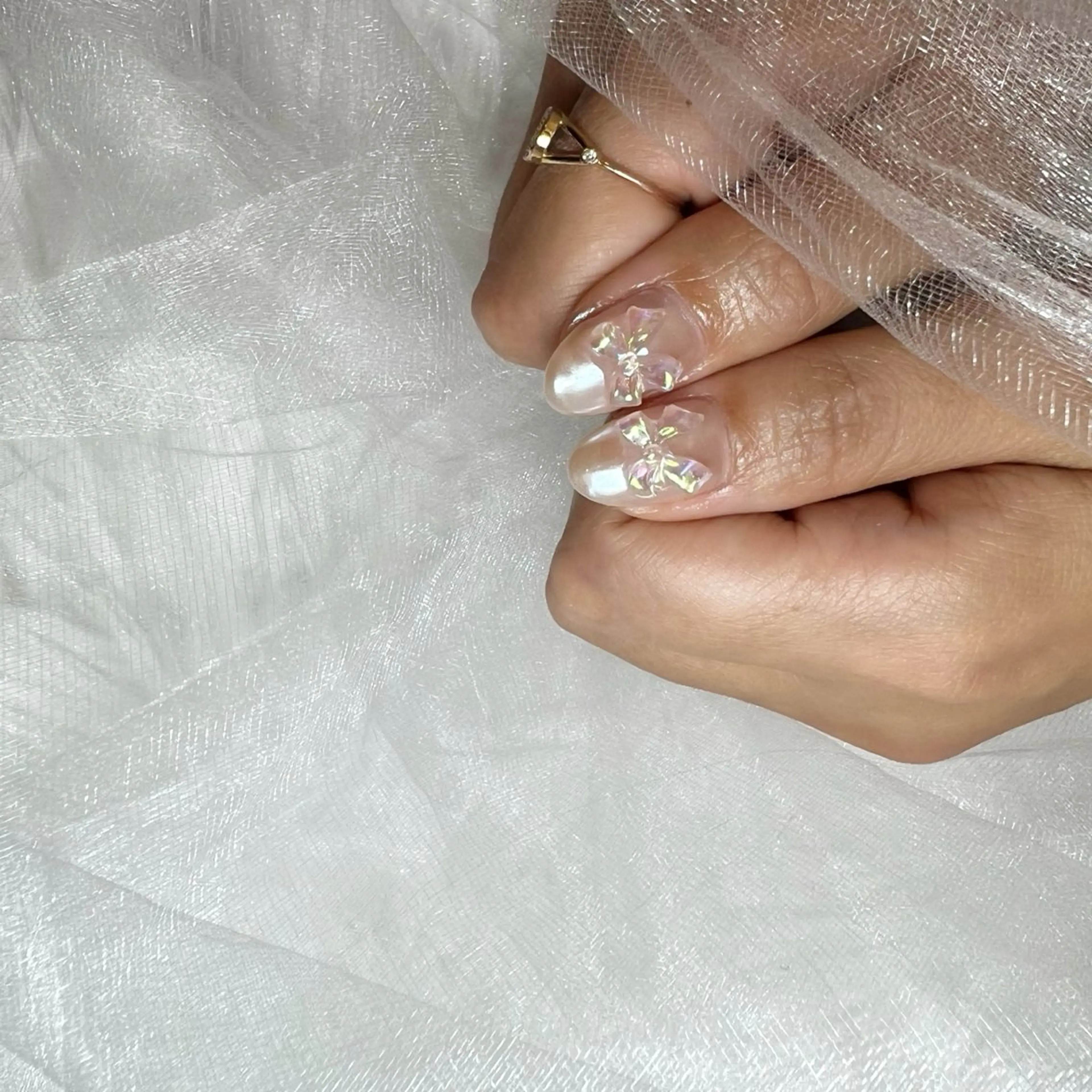 ネイル ミラーネイル リボン ハンドネイル Lili nail所属・Lilibeauty salonのネイルデザイン