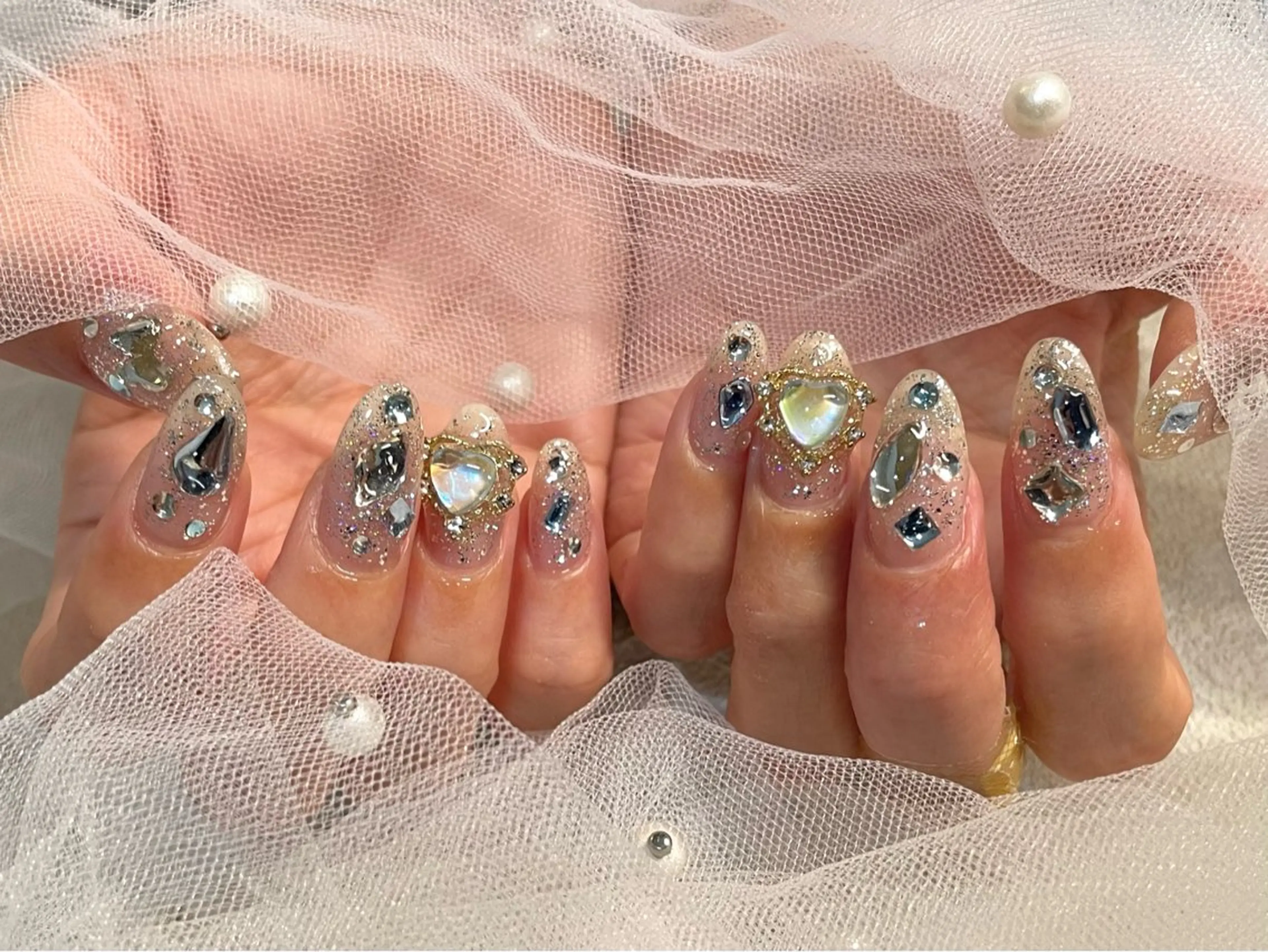 大人気🧡宝石ネイル💎✨ラメワンカラーに10本キラキラストーン👑¥9900→¥6800の写真
