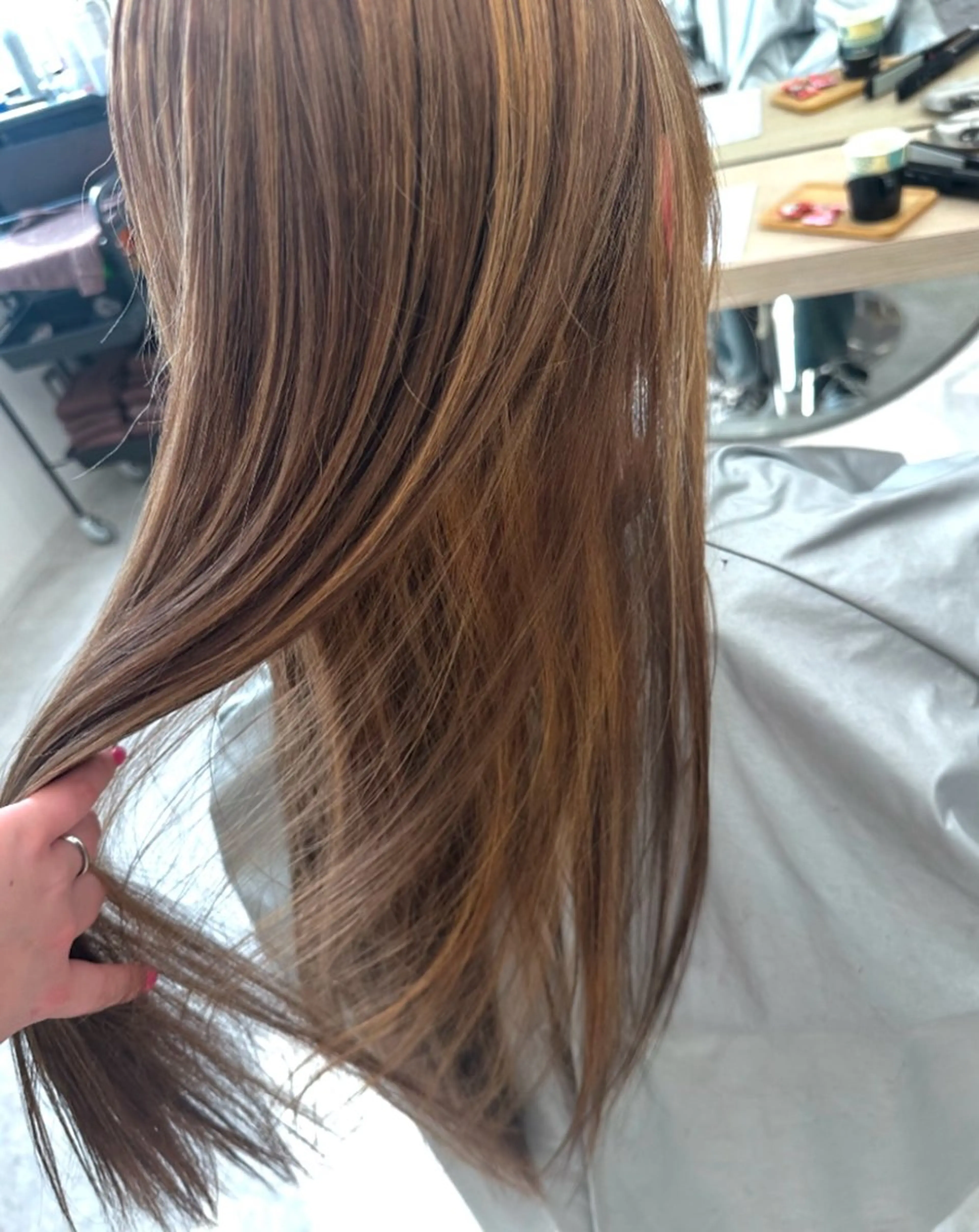 ロング カラー KUWAO MOEのヘアスタイル