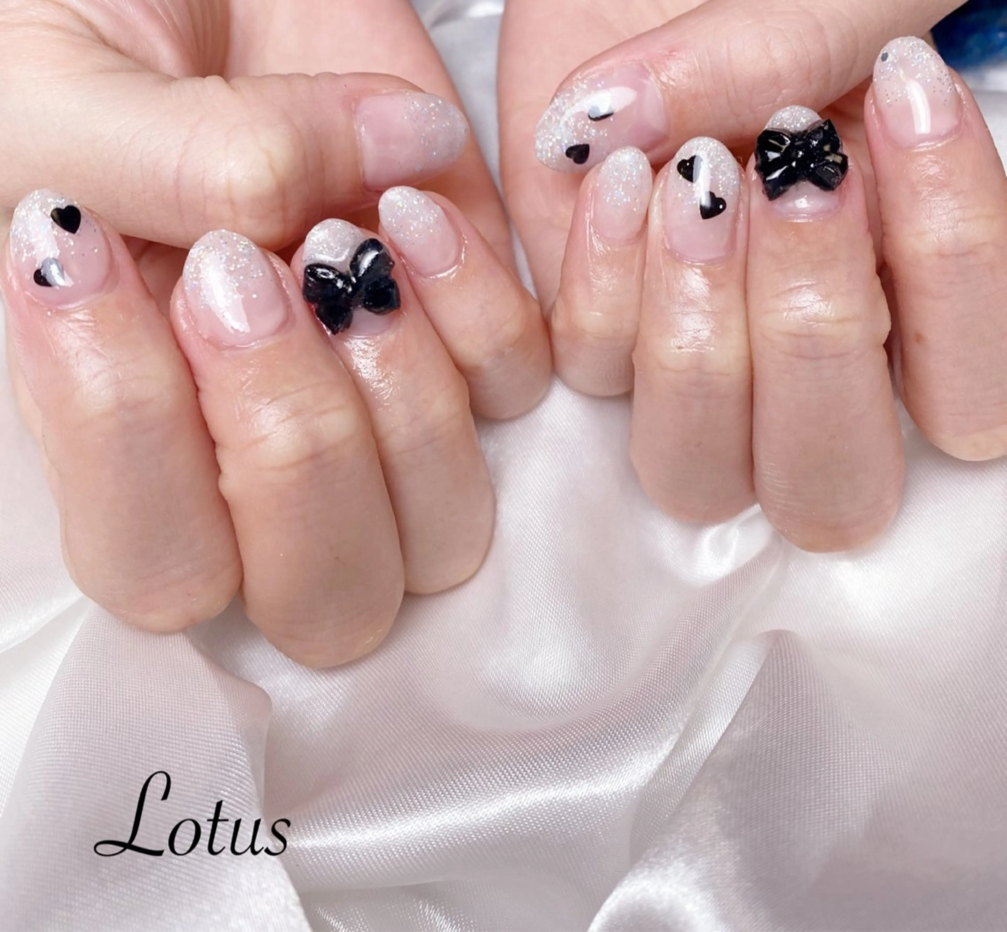 ネイル ガーリー リボン ハンドネイル Lotus 🌸のネイルデザイン
