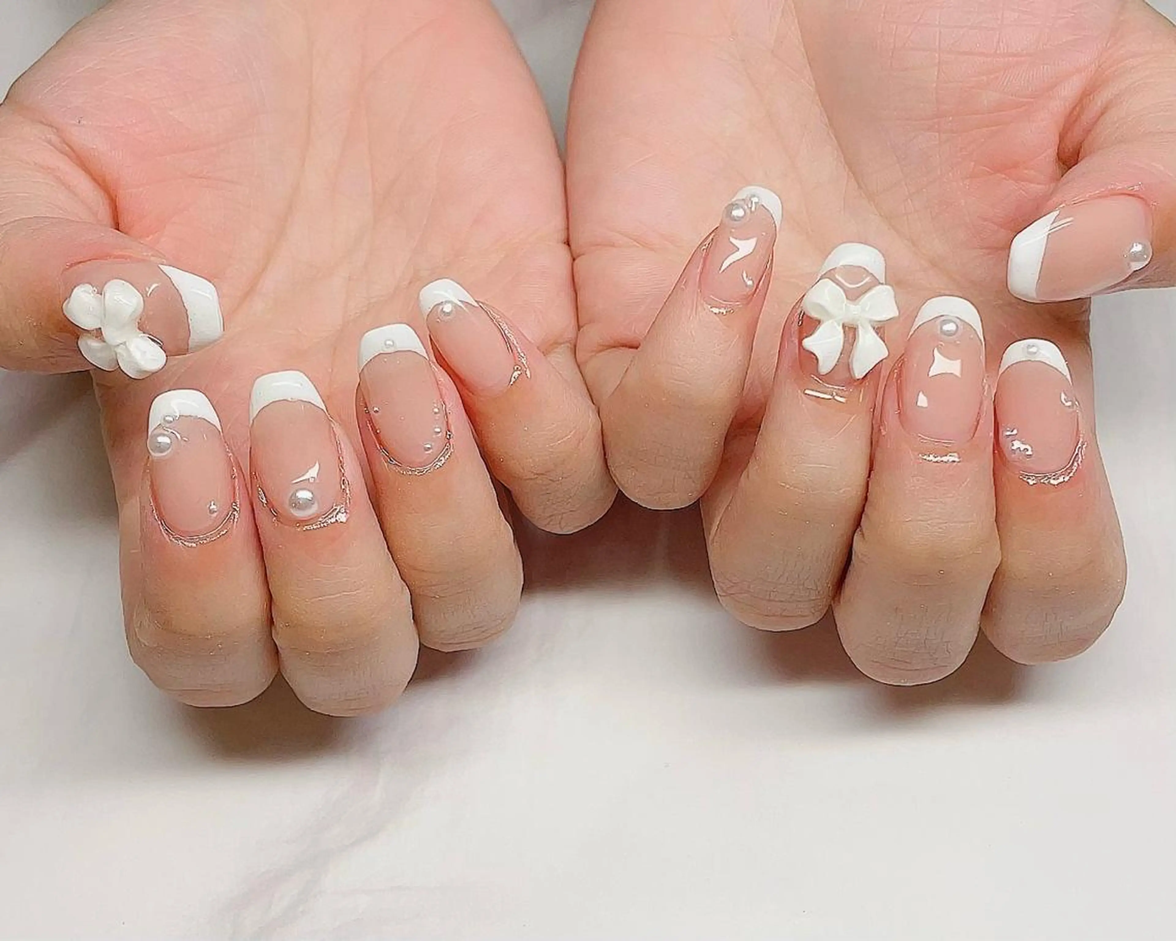 ミディアム ネイル フレンチネイル リボン ハンドネイル NailbyN所属・Nail_by N1のネイルデザイン