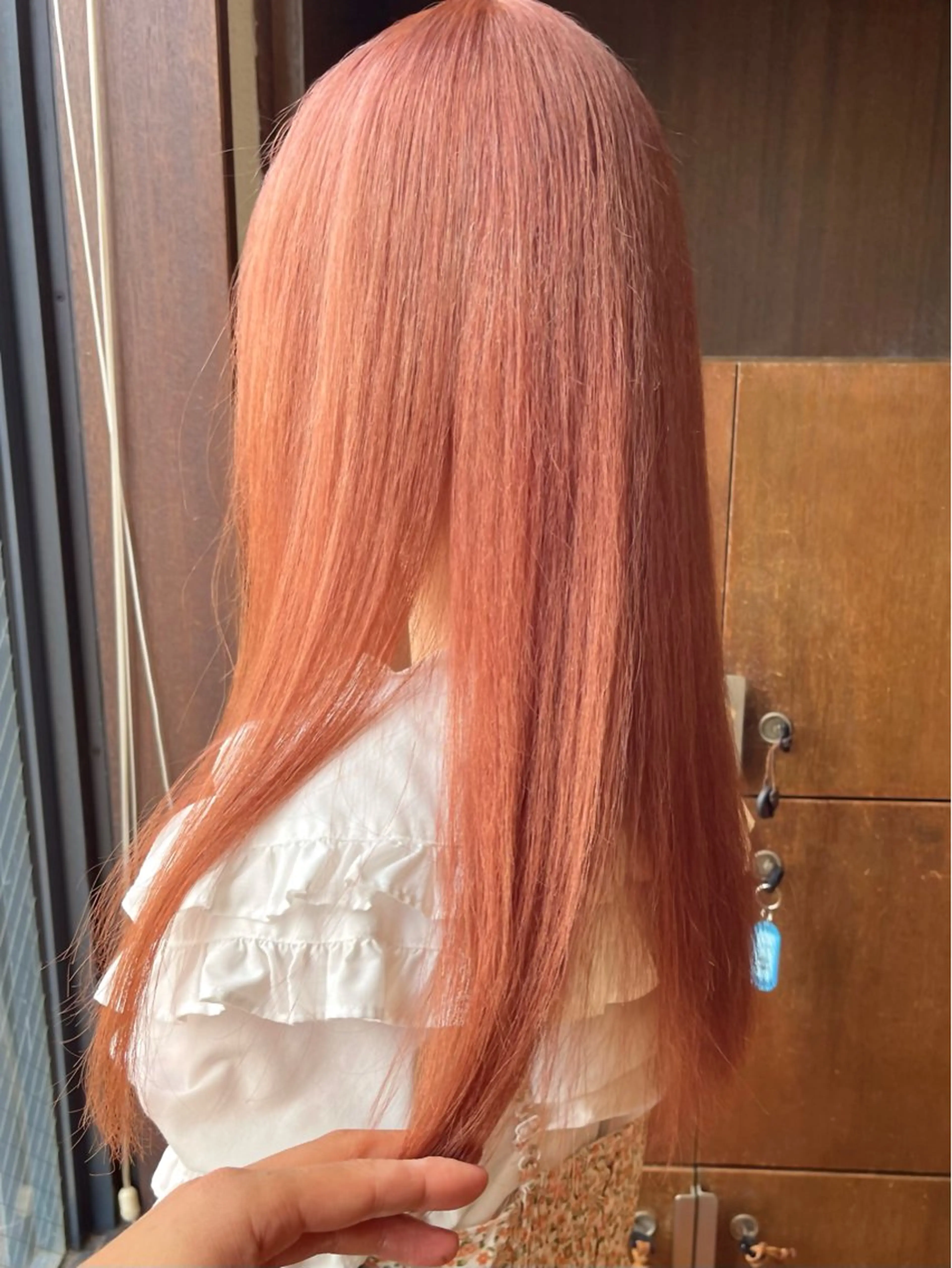 ロング カラー オレンジ カット ヘアカラー トリートメント 髪質改善ｶﾗｰ ｹｱﾌﾞﾘｰﾁ/ﾀﾑのヘアスタイル