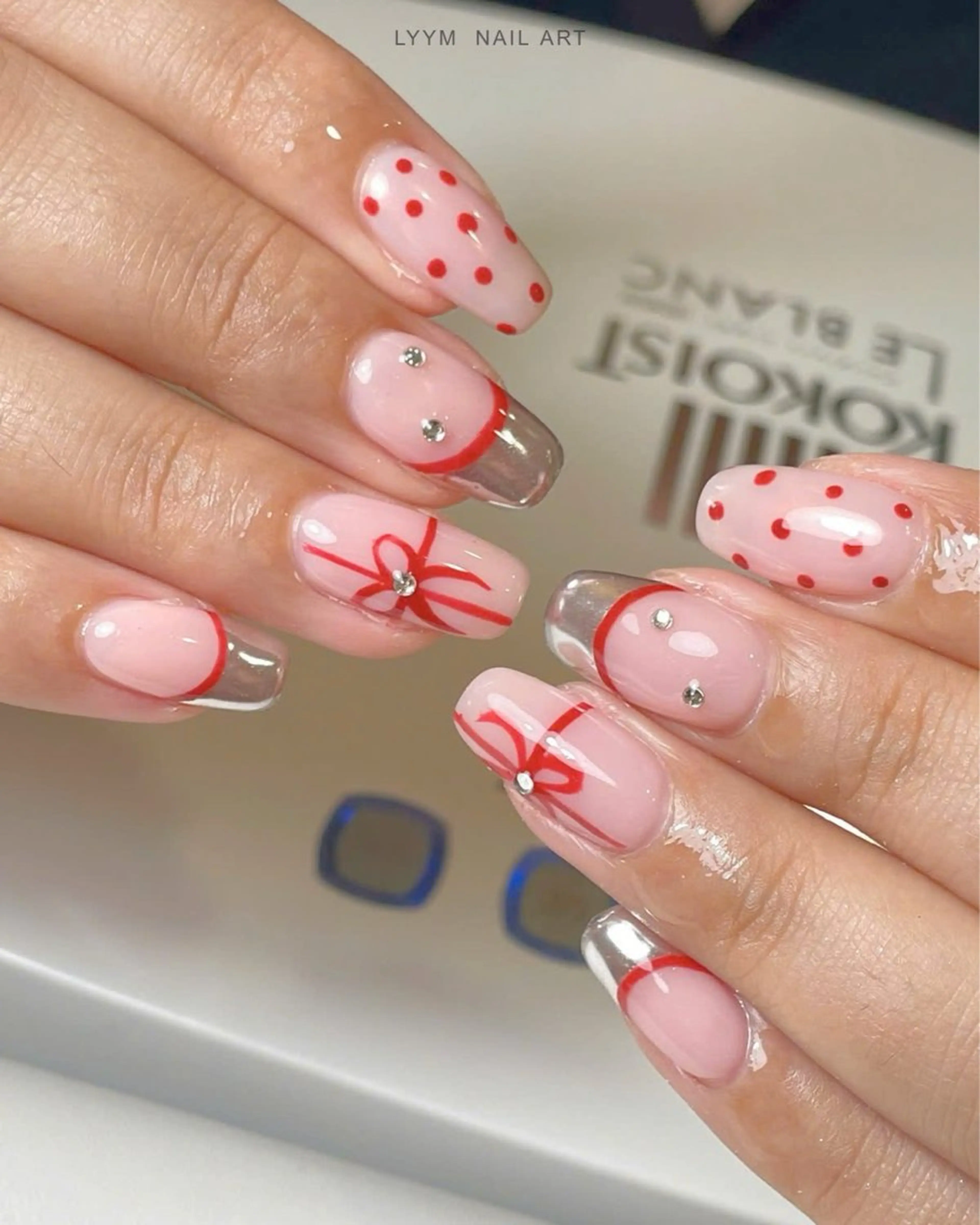 ネイル アートネイル ドット 韓国ネイル 赤色 リボン ハンドネイル LYYM Nail Salonのネイルデザイン