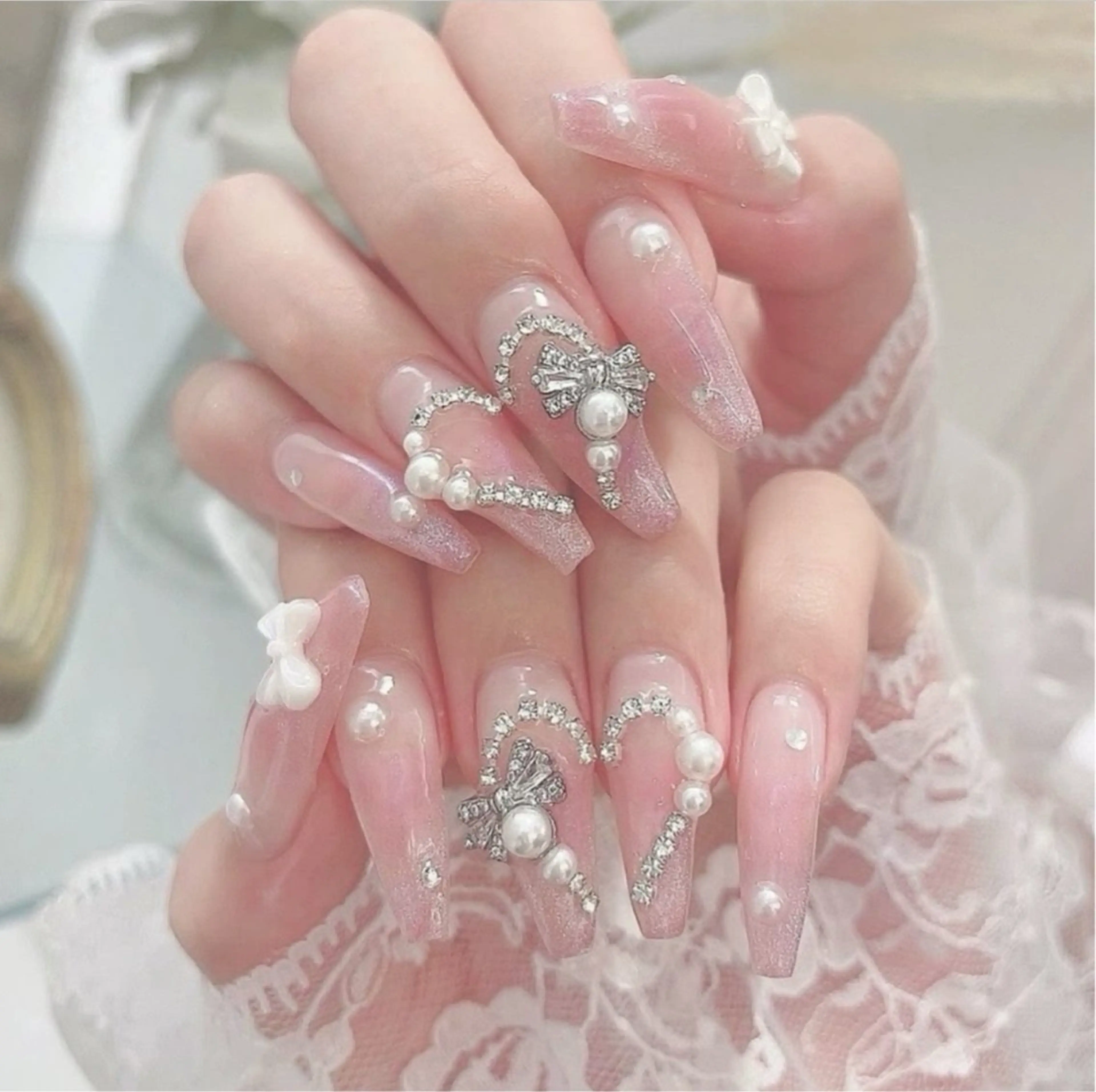 ネイル 成人式 ロングネイル マグネットネイル 大理石ネイル(マーブル) リボン ハンドネイル Amee Nailsalon所属・Amee Nailsalonのネイルデザイン