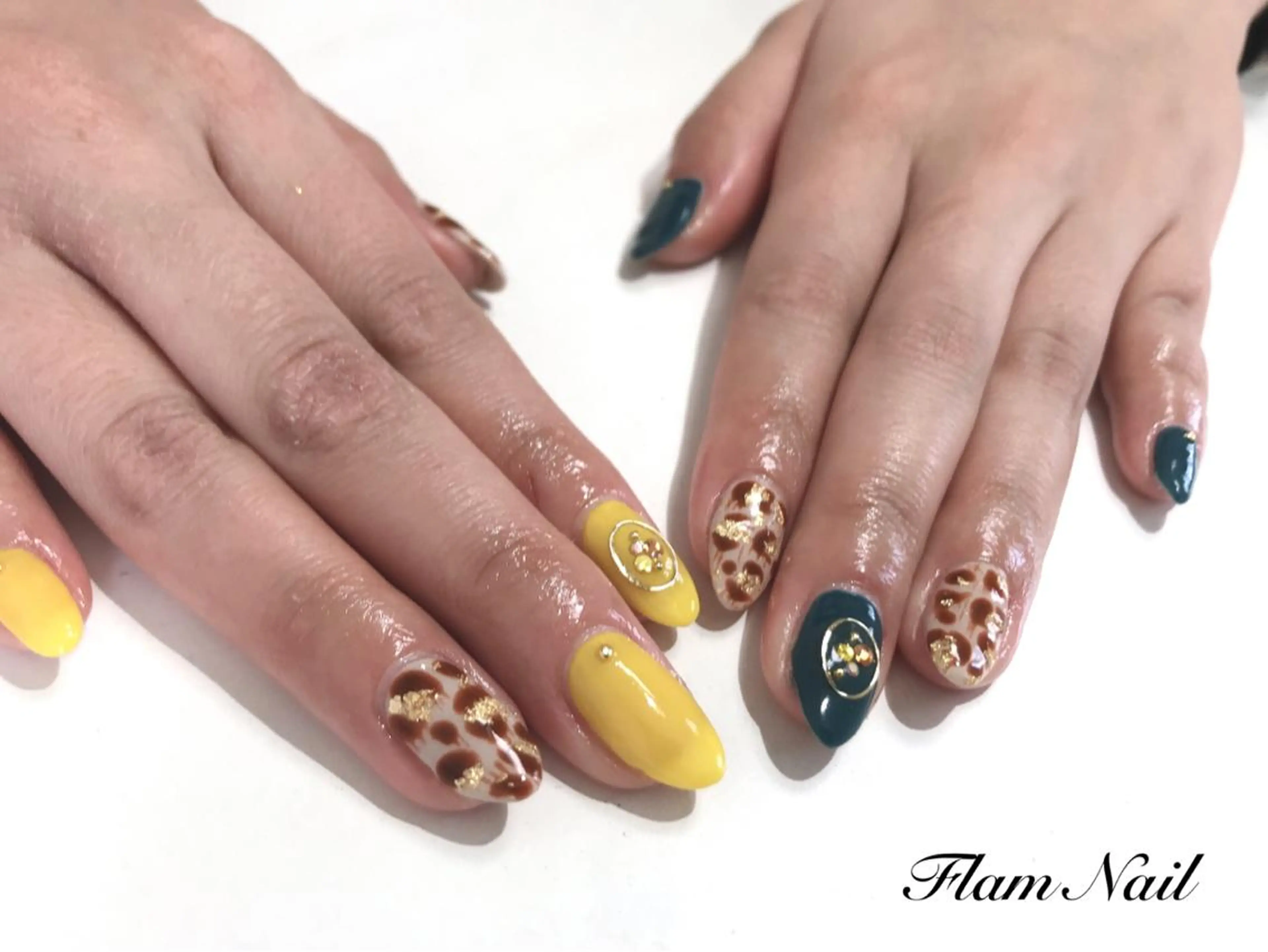 ネイル アニマル柄 黄色 Flam Nailのネイルデザイン