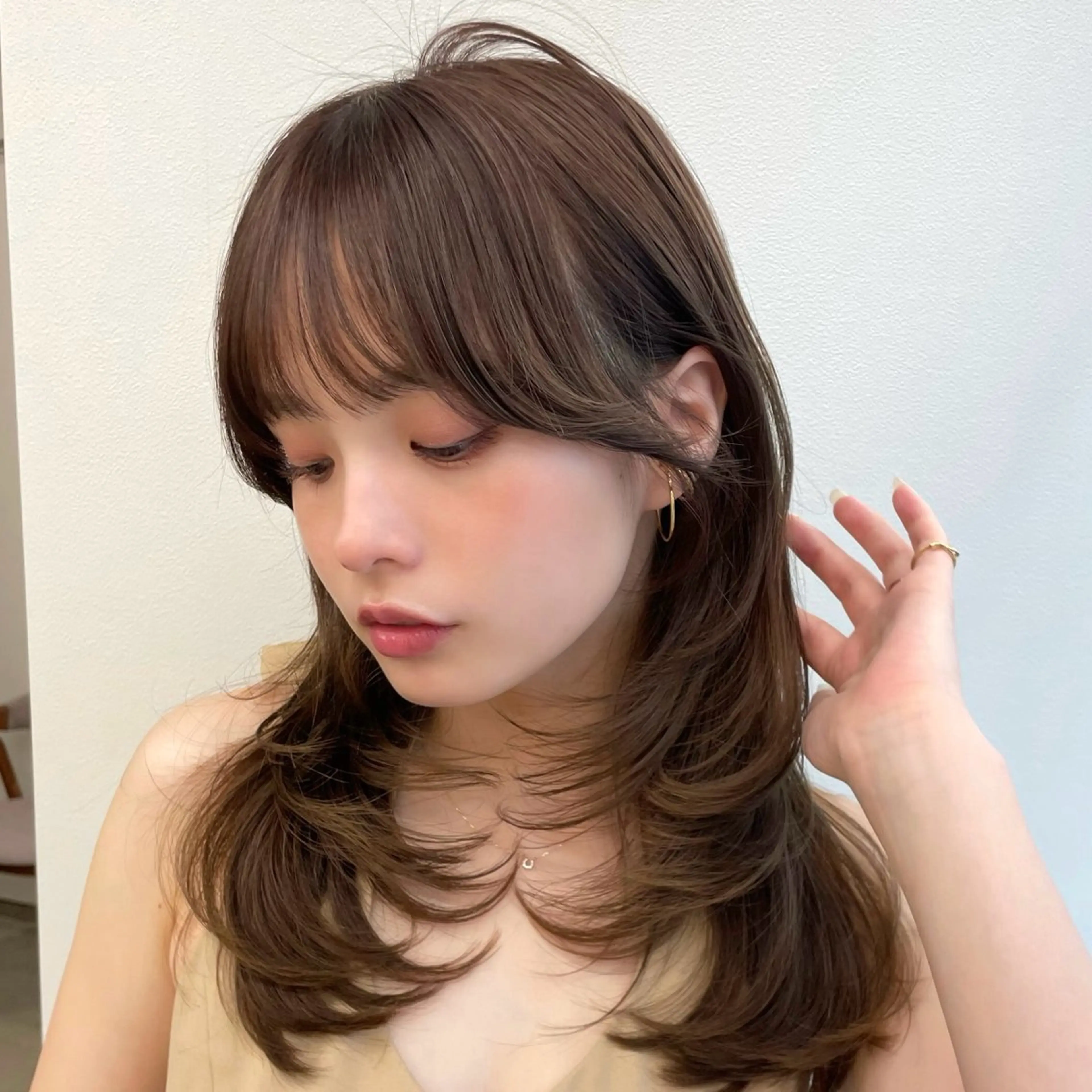 セミロング レイヤーカット カット ヘアカラー POCKET渋谷所属・レイヤーカット minamiのヘアスタイル