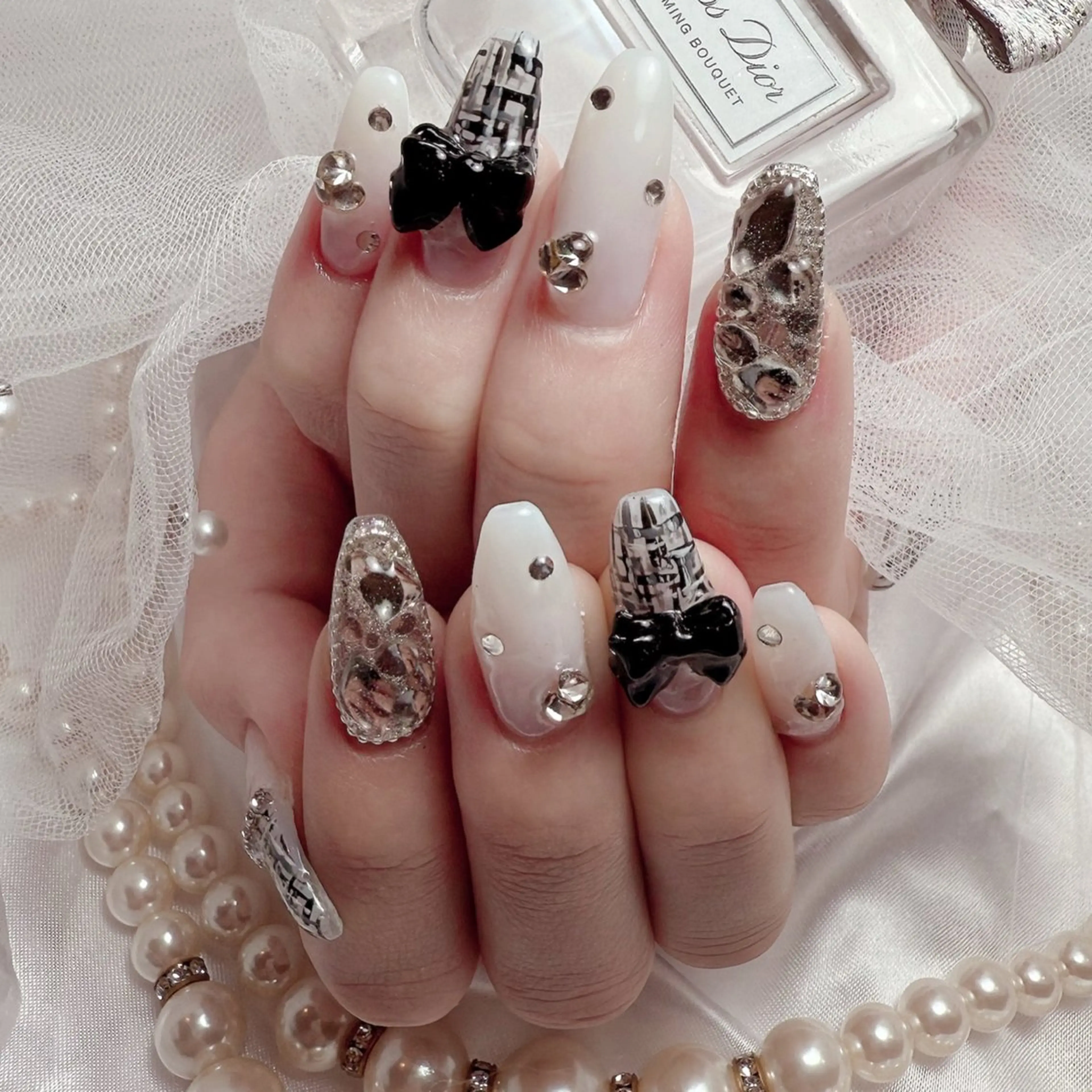 セミロング ハンドネイル Conjunim MAMI🎀✨のネイルデザイン