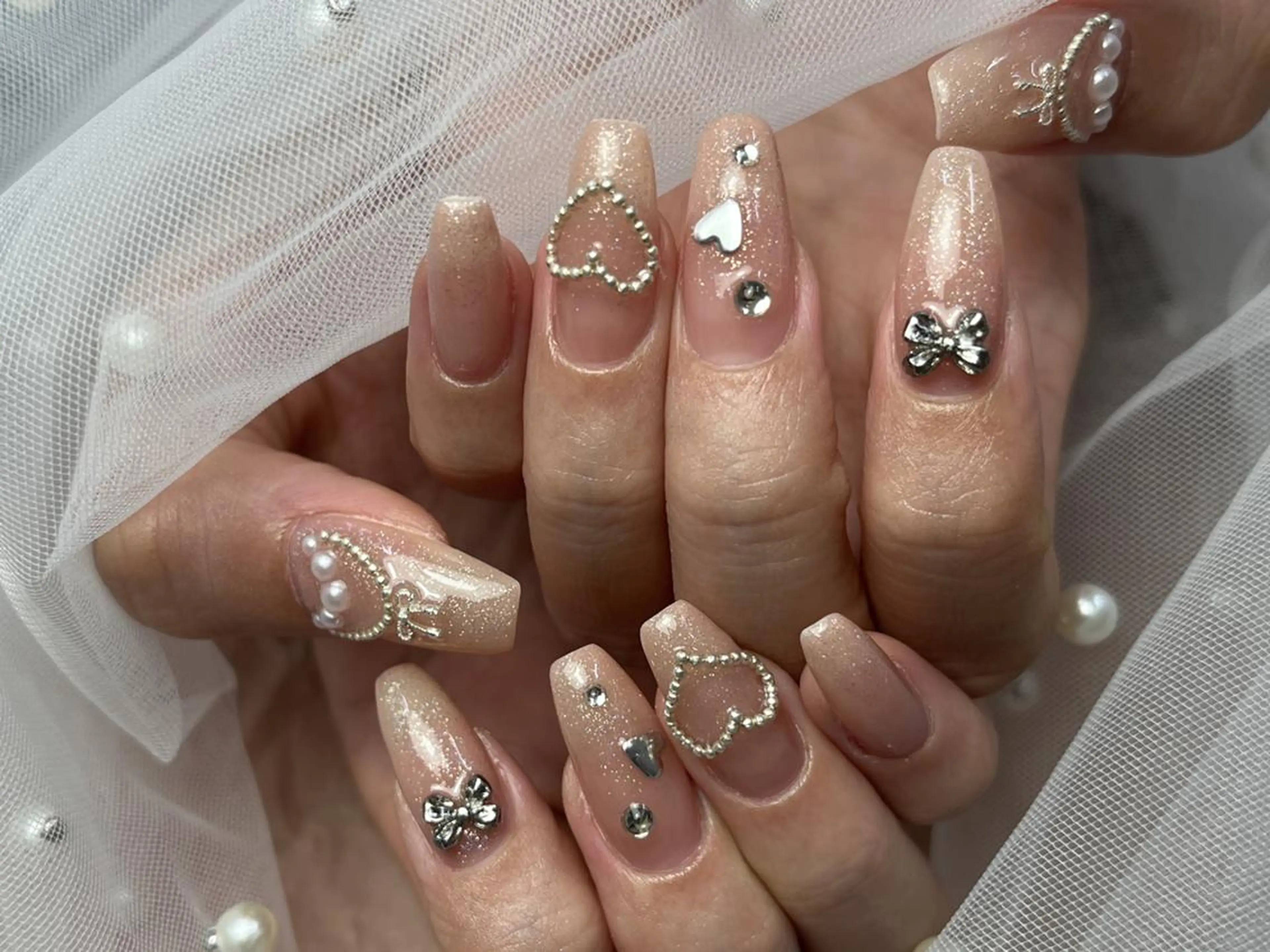 ネイル ハート ピンク リボン ストーンネイル ハンドネイル ToliyDeliy Nail Salonのネイルデザイン