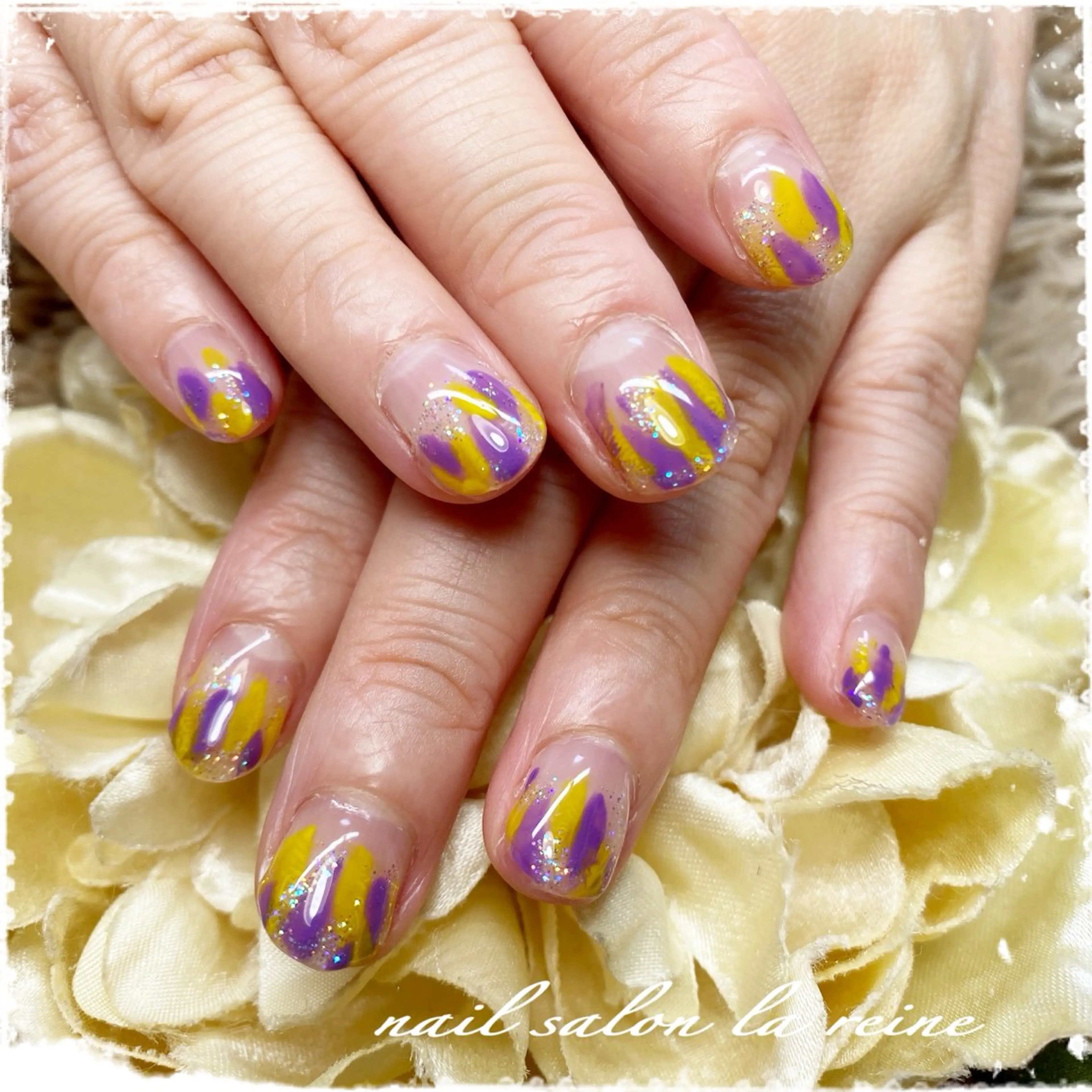 ネイル パープル 黄色 nail salon  la reine所属・nail salon la reineのネイルデザイン