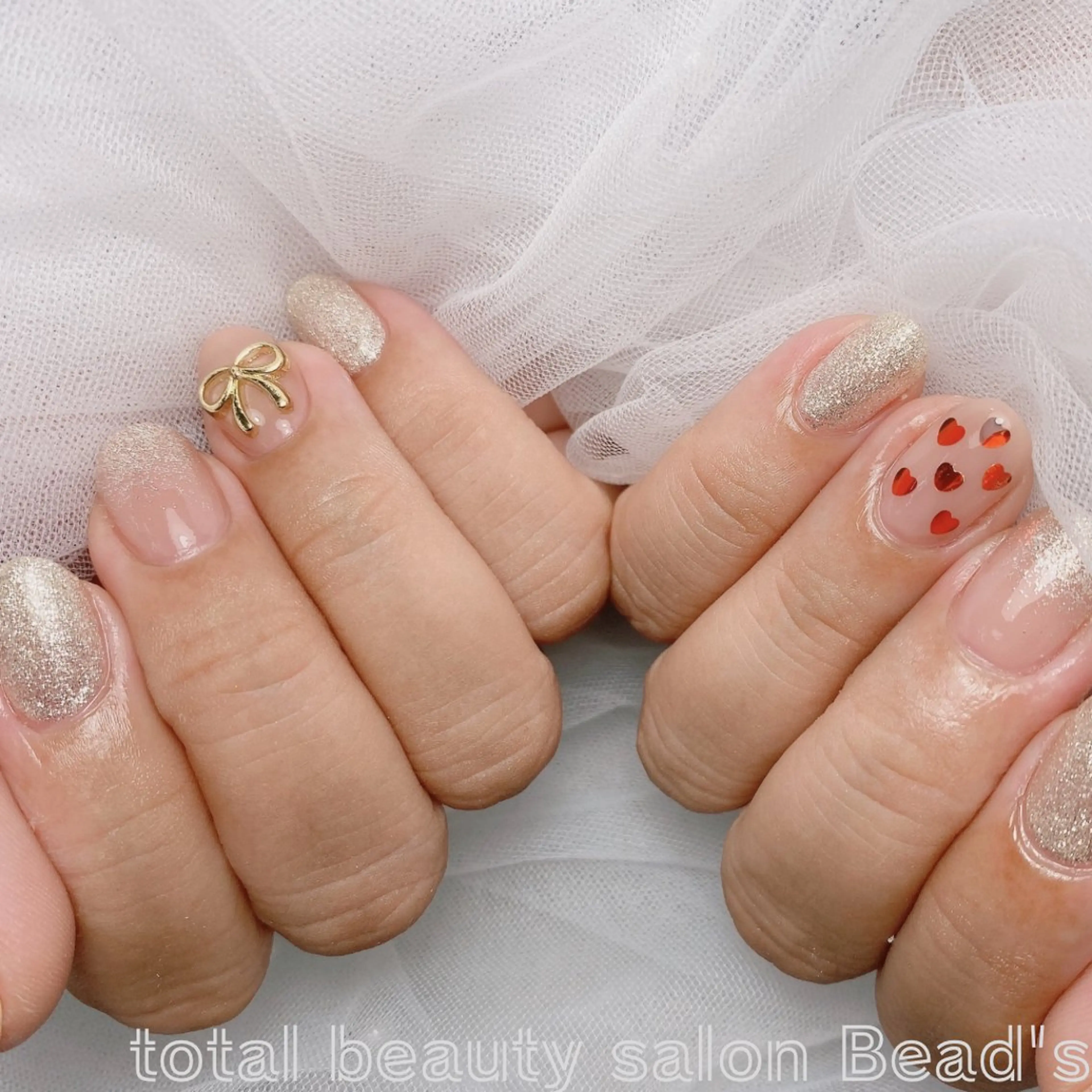 ネイル ハート リボン ハンドネイル ネイルサロン　ビーズ所属・トータルビューティー サロンビーズ すずのネイルデザイン