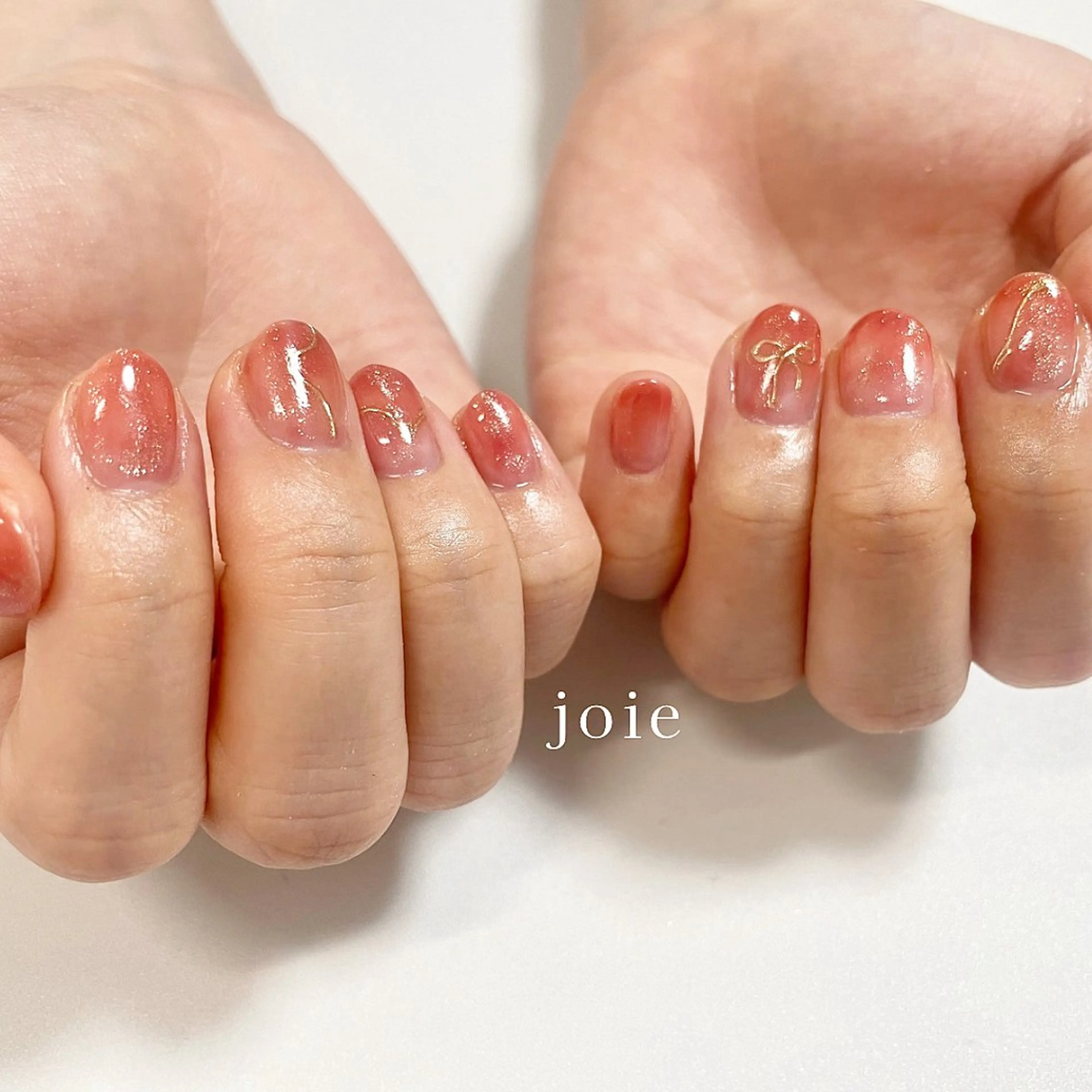 ネイル キラキラネイル 韓国ネイル ニュアンスネイル オフィスネイル リボン Nailist Mikuのネイルデザイン