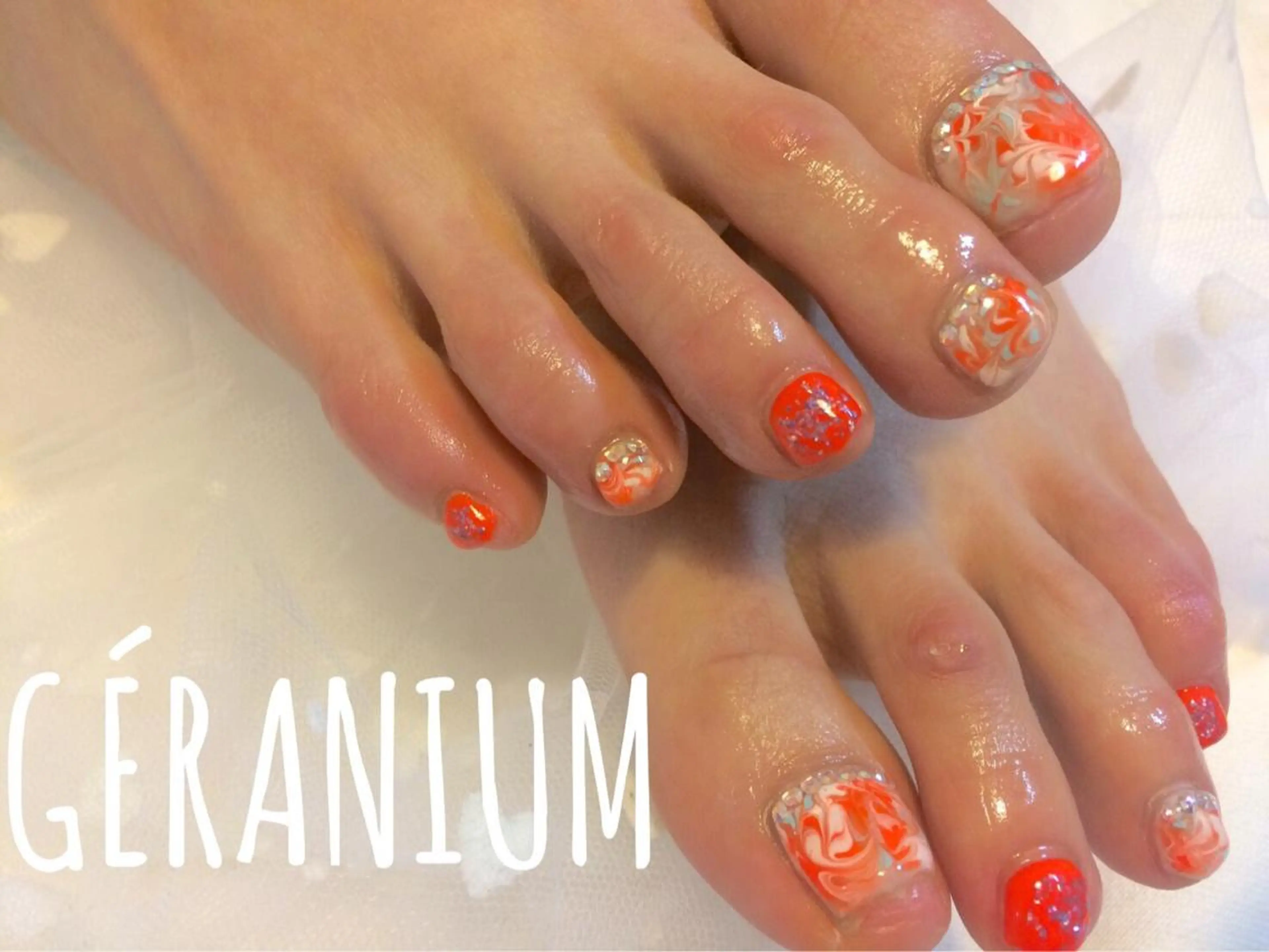 ネイル フットネイル 大理石ネイル(マーブル) オレンジ GéRanium Harukaのネイルデザイン