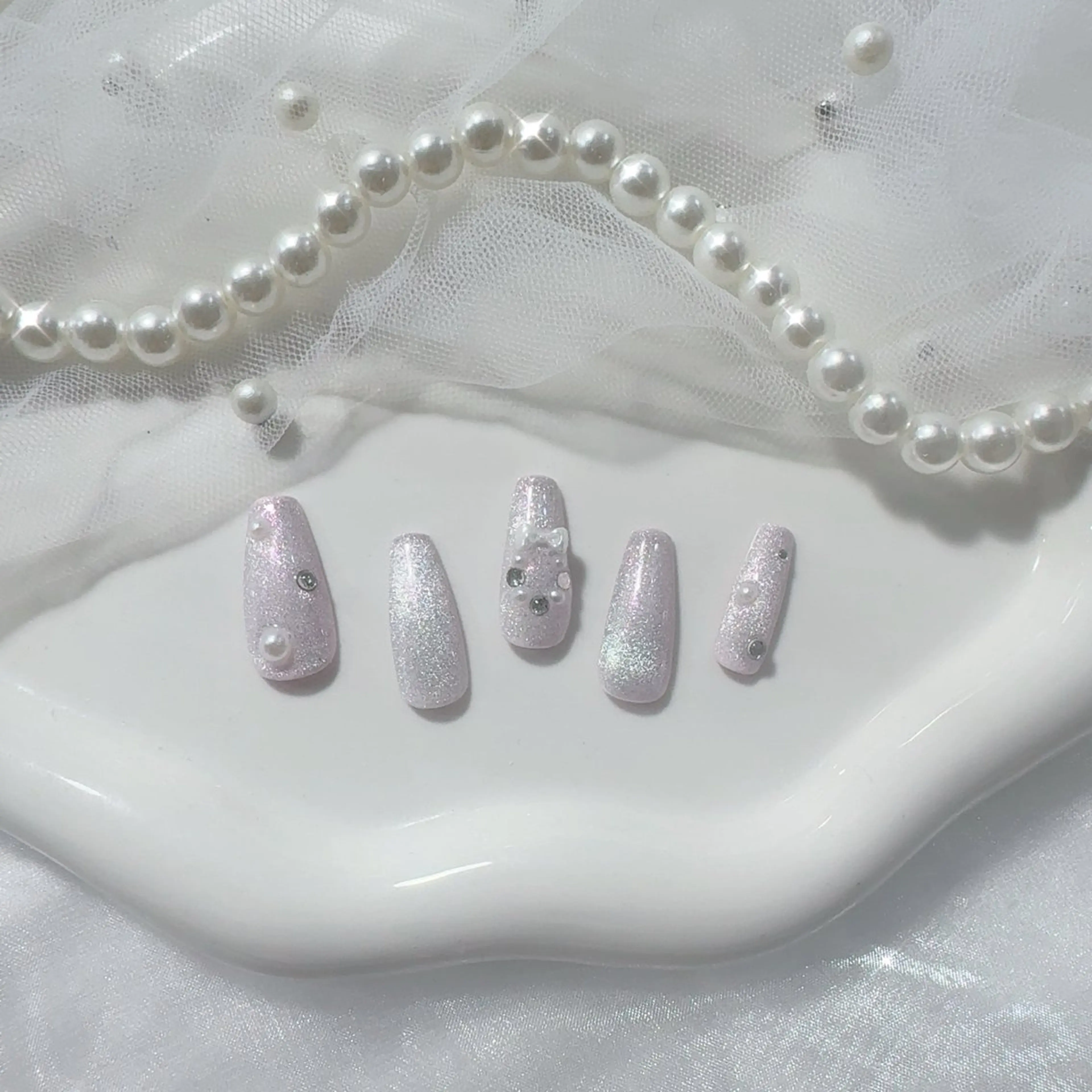 ネイル キラキラネイル 冬ネイル クリスマス ハンドネイル emu 心斎橋店 nanohaのネイルデザイン