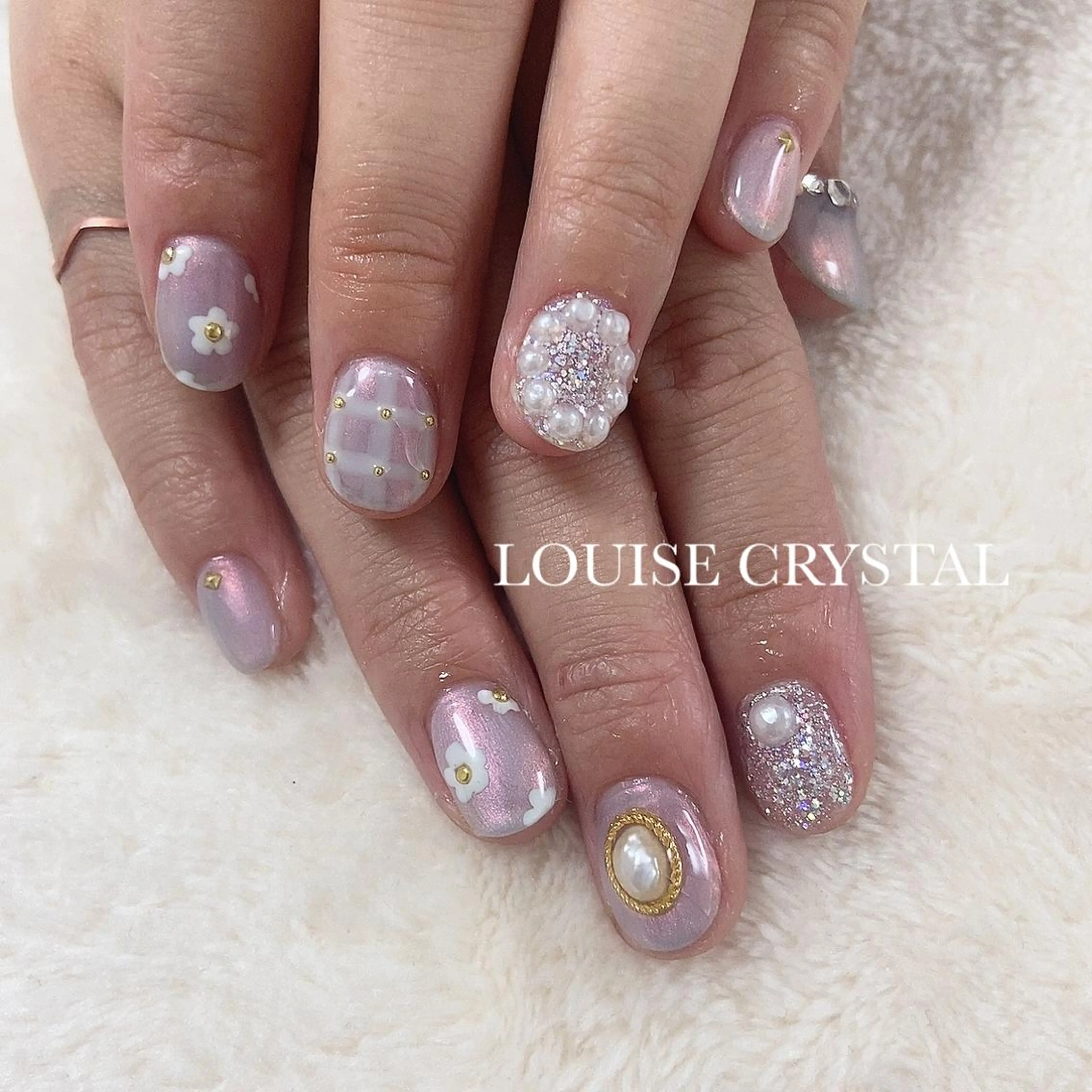 ネイル ハンドネイル LOUISE CRYSTALのネイルデザイン
