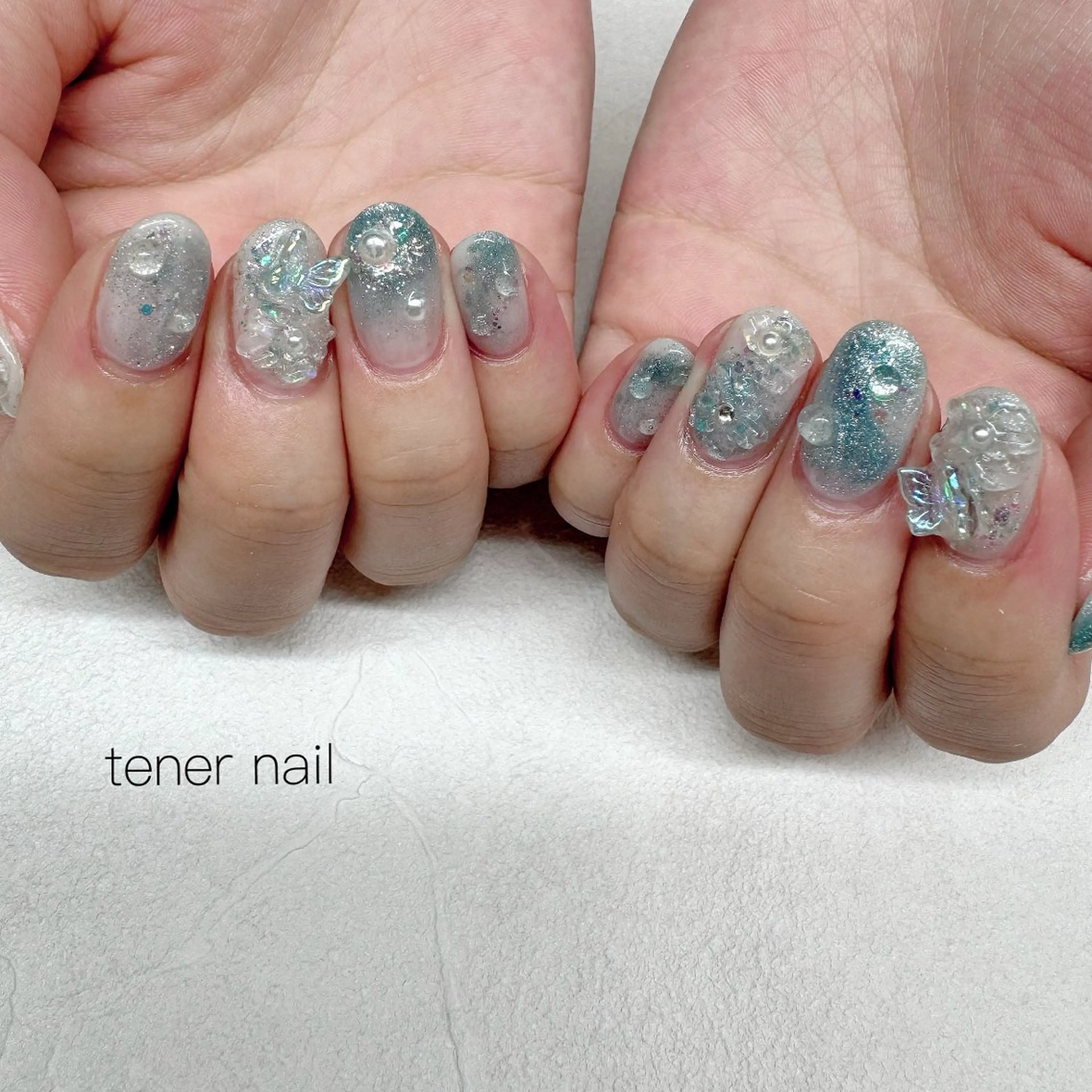 ネイル ブルー キラキラネイル ハンドネイル tener  nail  テネルネイル所属・テネルネイル tener nailのネイルデザイン