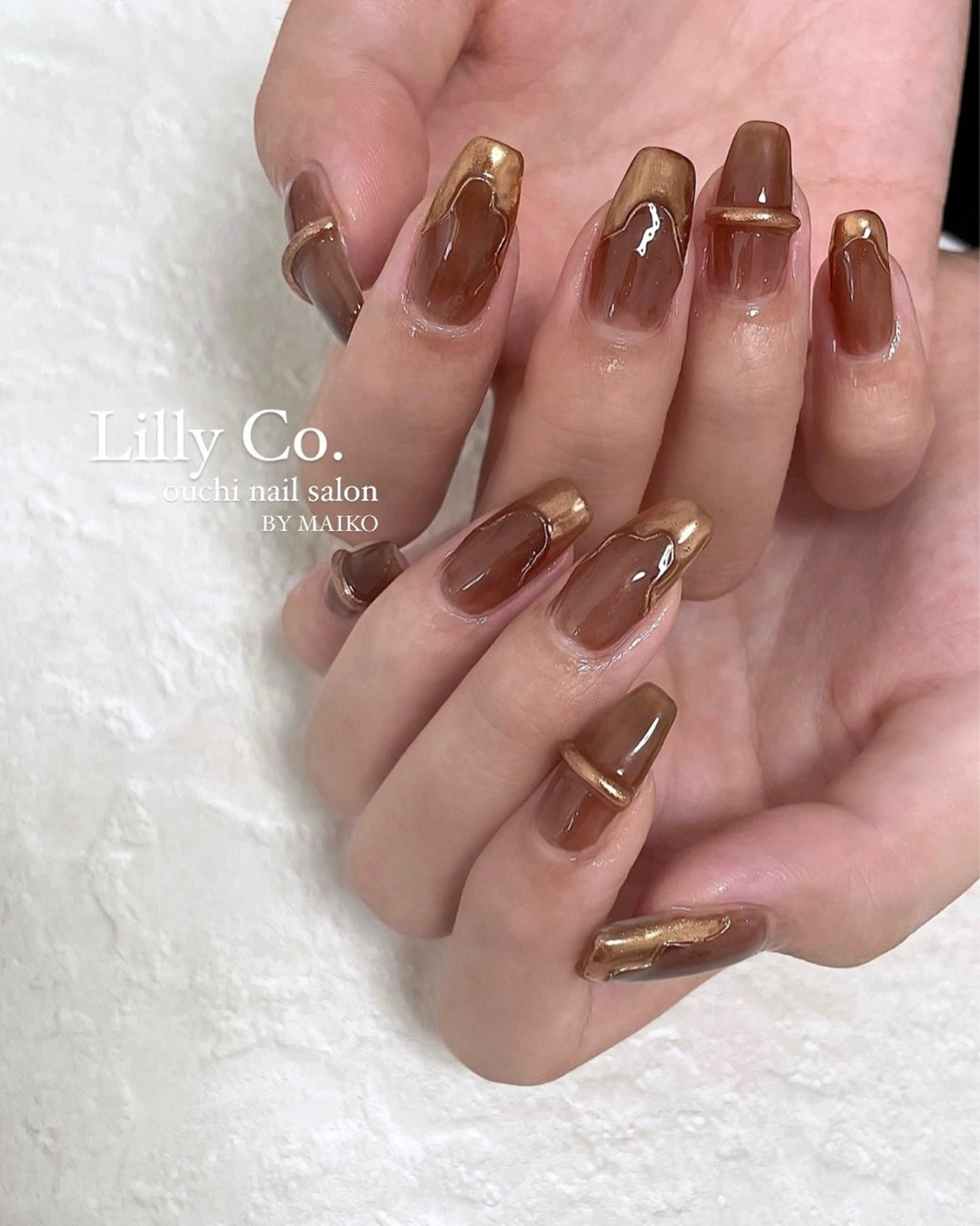 ネイル ブラウン ハンドネイル ハンドケア Lilly Co.のネイルデザイン