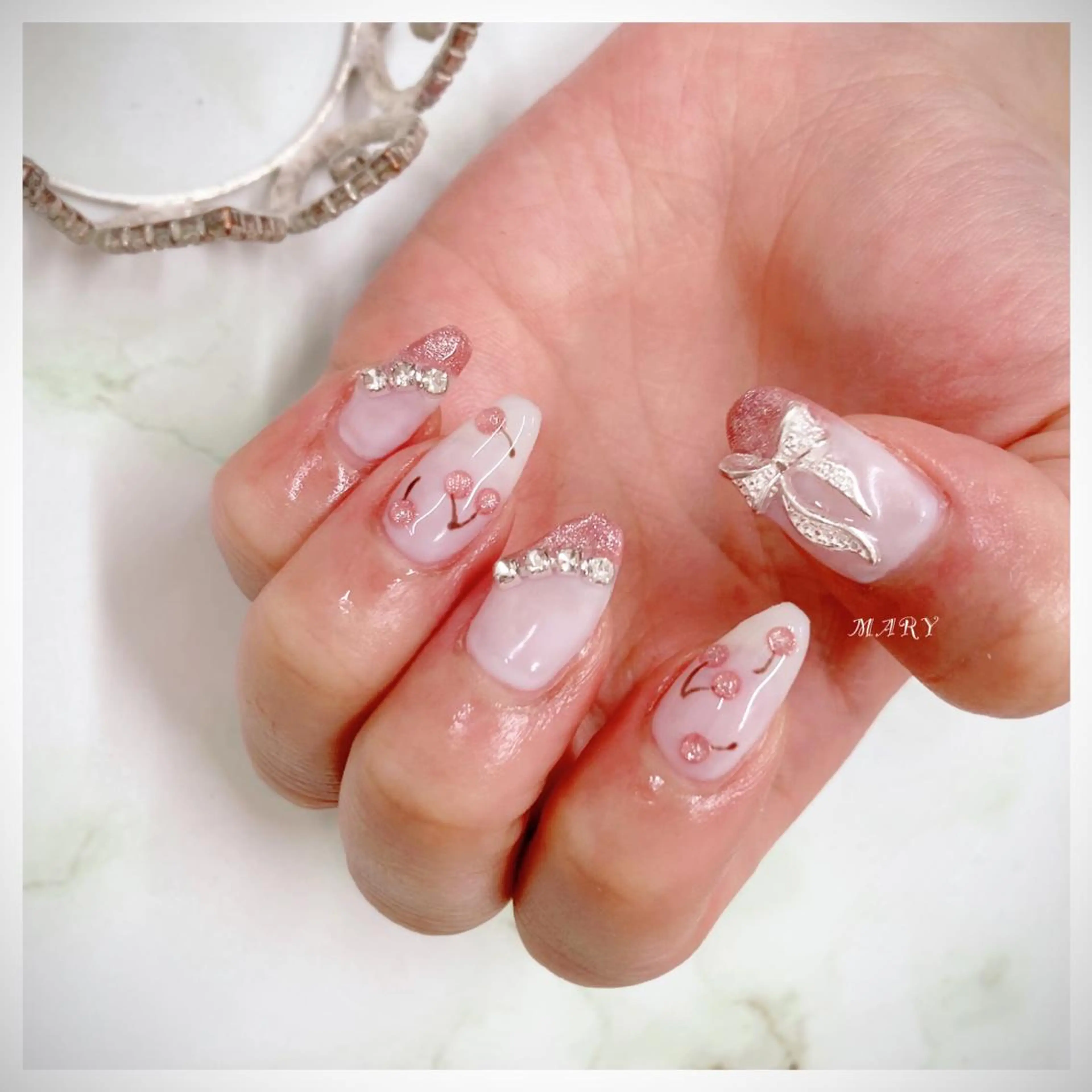 ネイル マグネットネイル ニュアンスネイル ピンク リボン ハンドネイル Mary nail所属・Mary nail .narumiのネイルデザイン