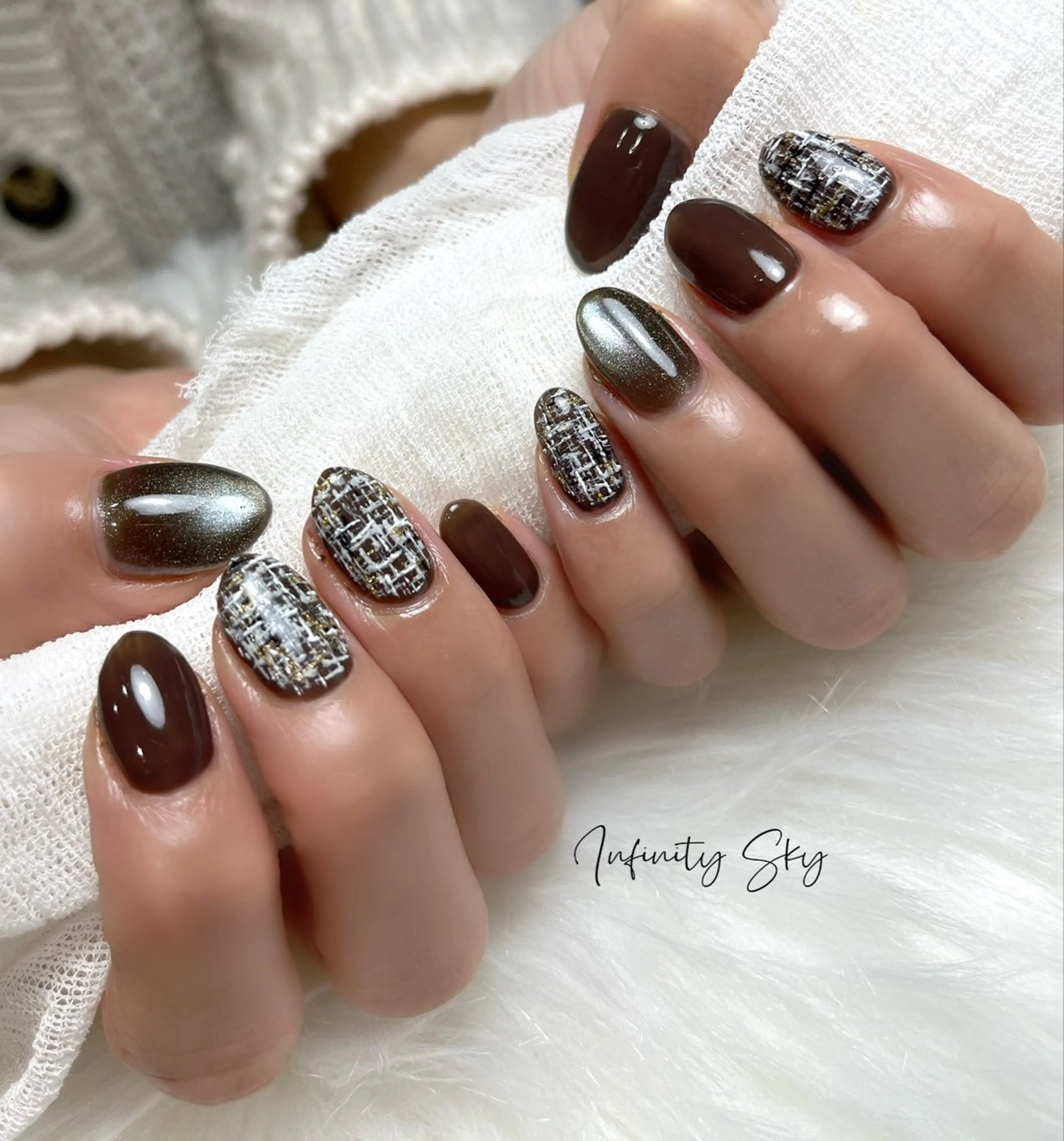 ネイル マグネットネイル ツイードネイル 冬ネイル クリスマス infinity skyのネイルデザイン