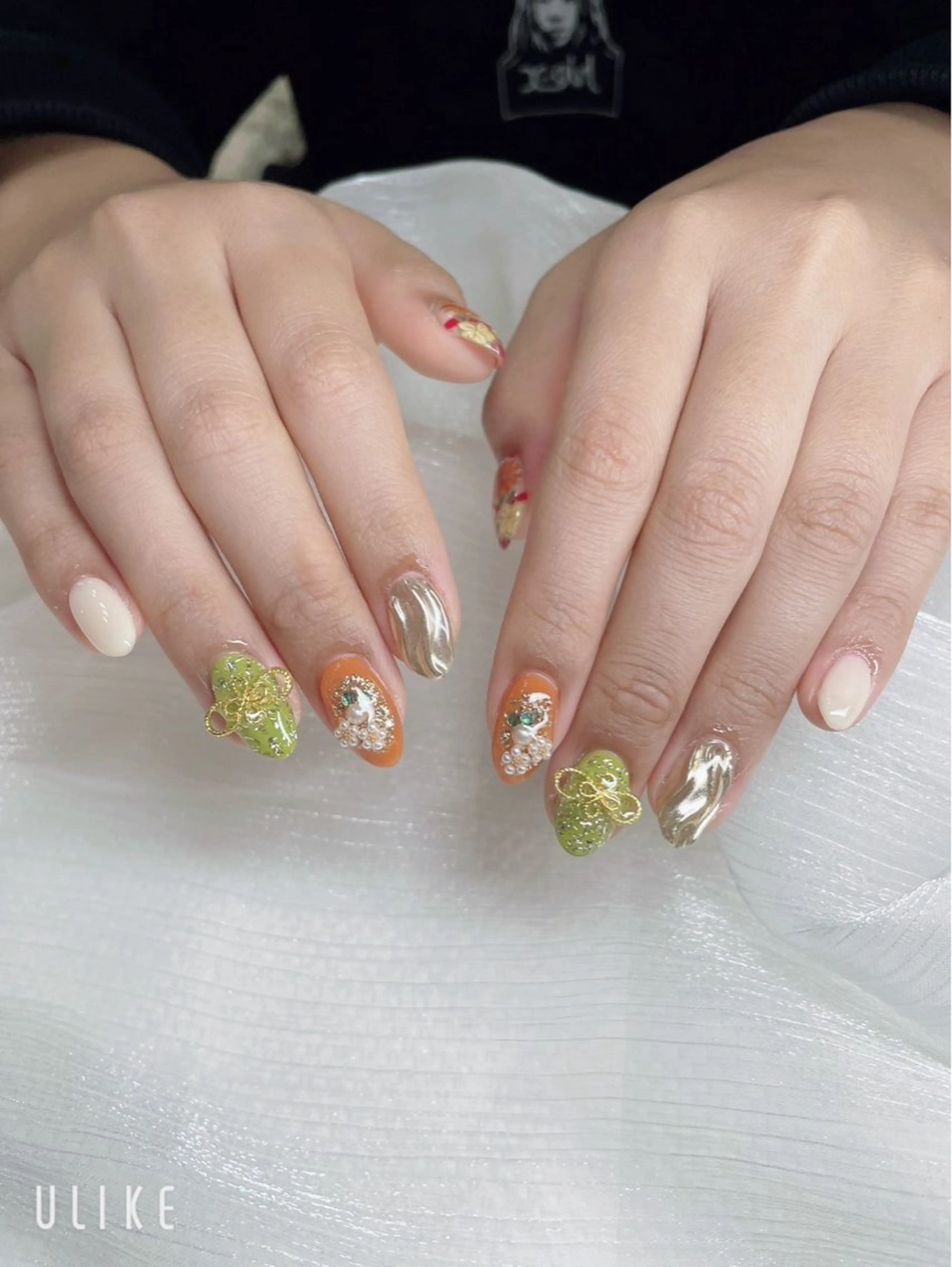 ネイル アートネイル 成人式 オレンジ リボン ハンドネイル L&Y Nail salonのネイルデザイン