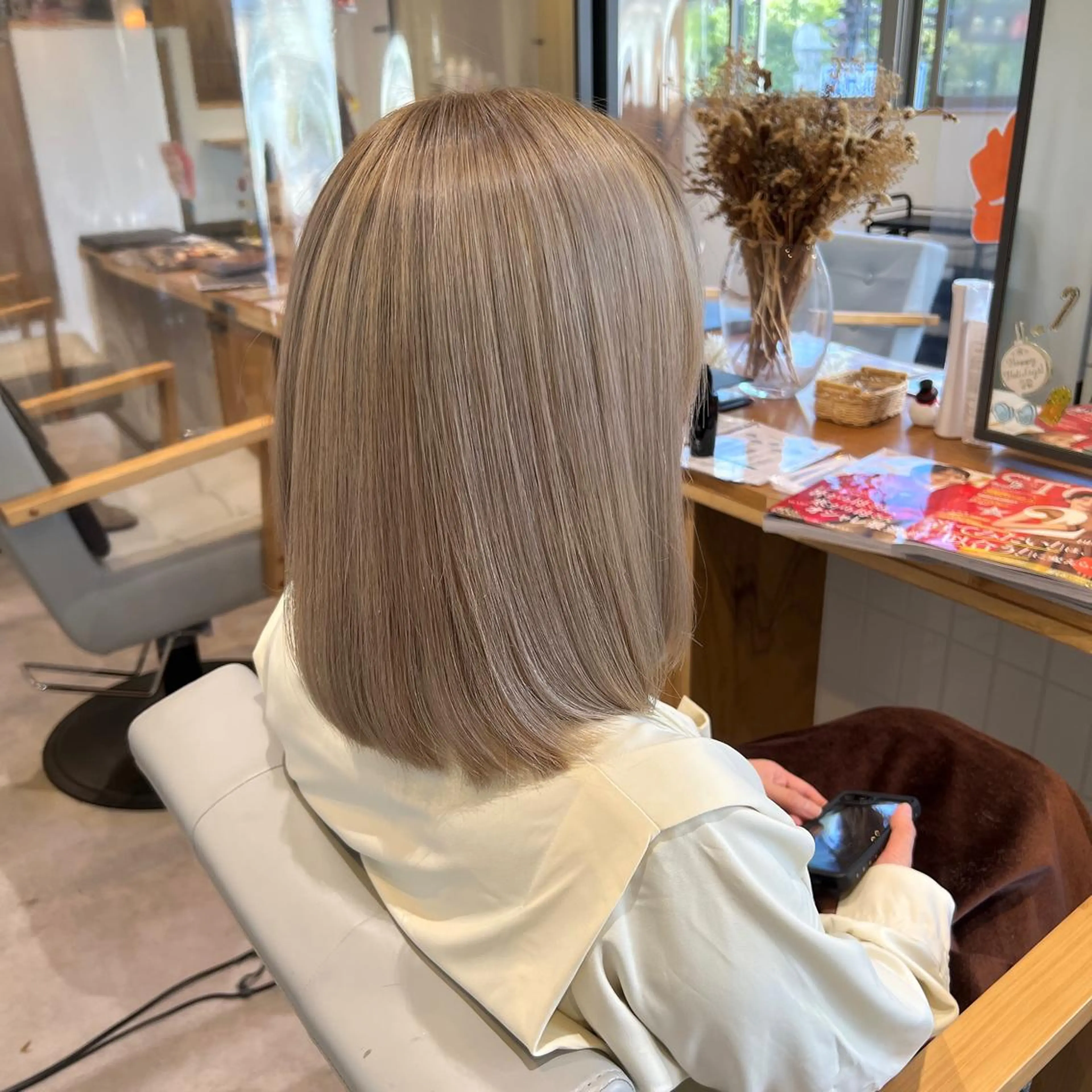ミディアム エクシア ニシキタのヘアスタイル