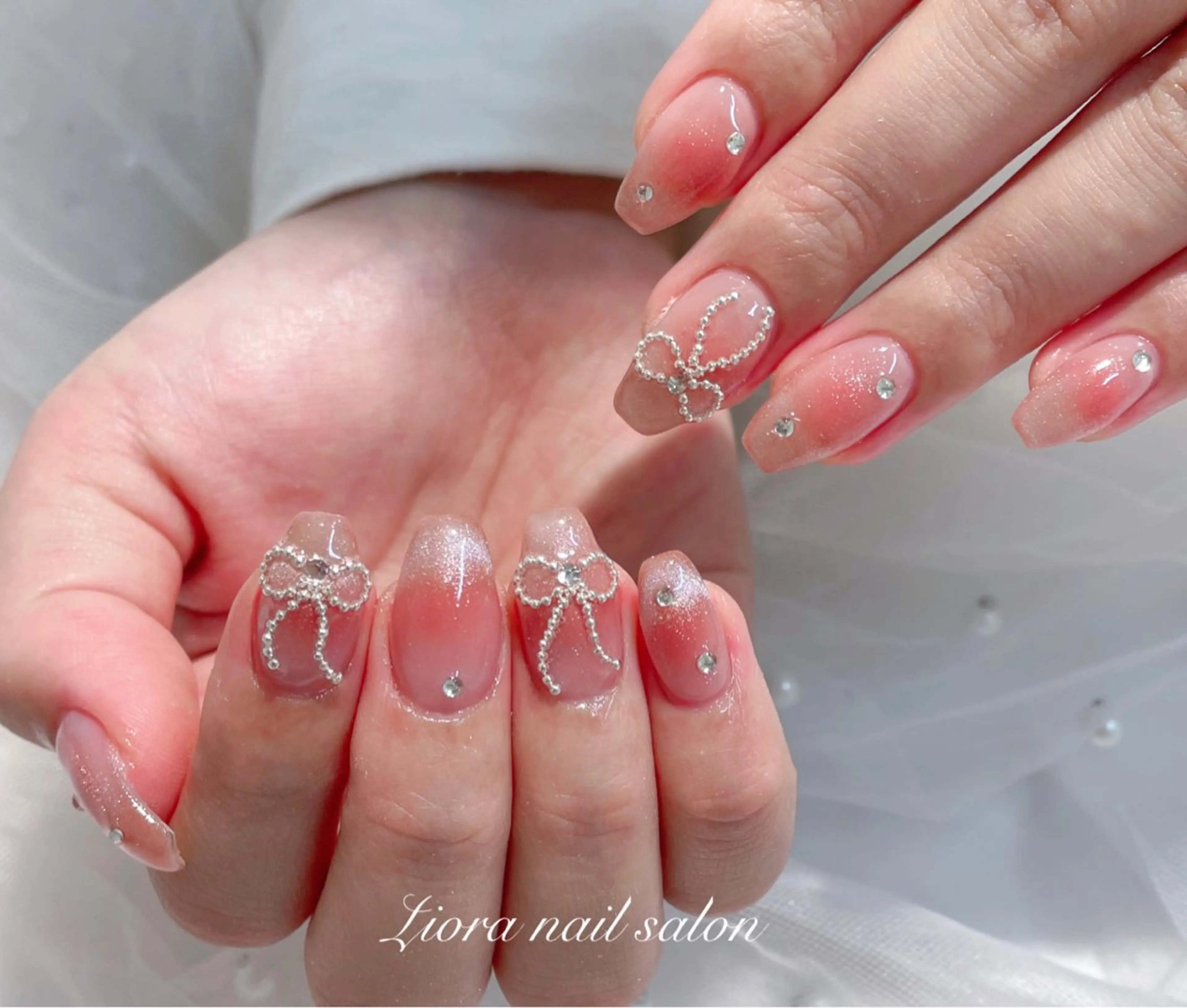 ネイル フレンチネイル ジェルネイル ガーリー グラデーション キラキラネイル ハンドネイル Liora ネイルサロン所属・Liora nail salonのネイルデザイン