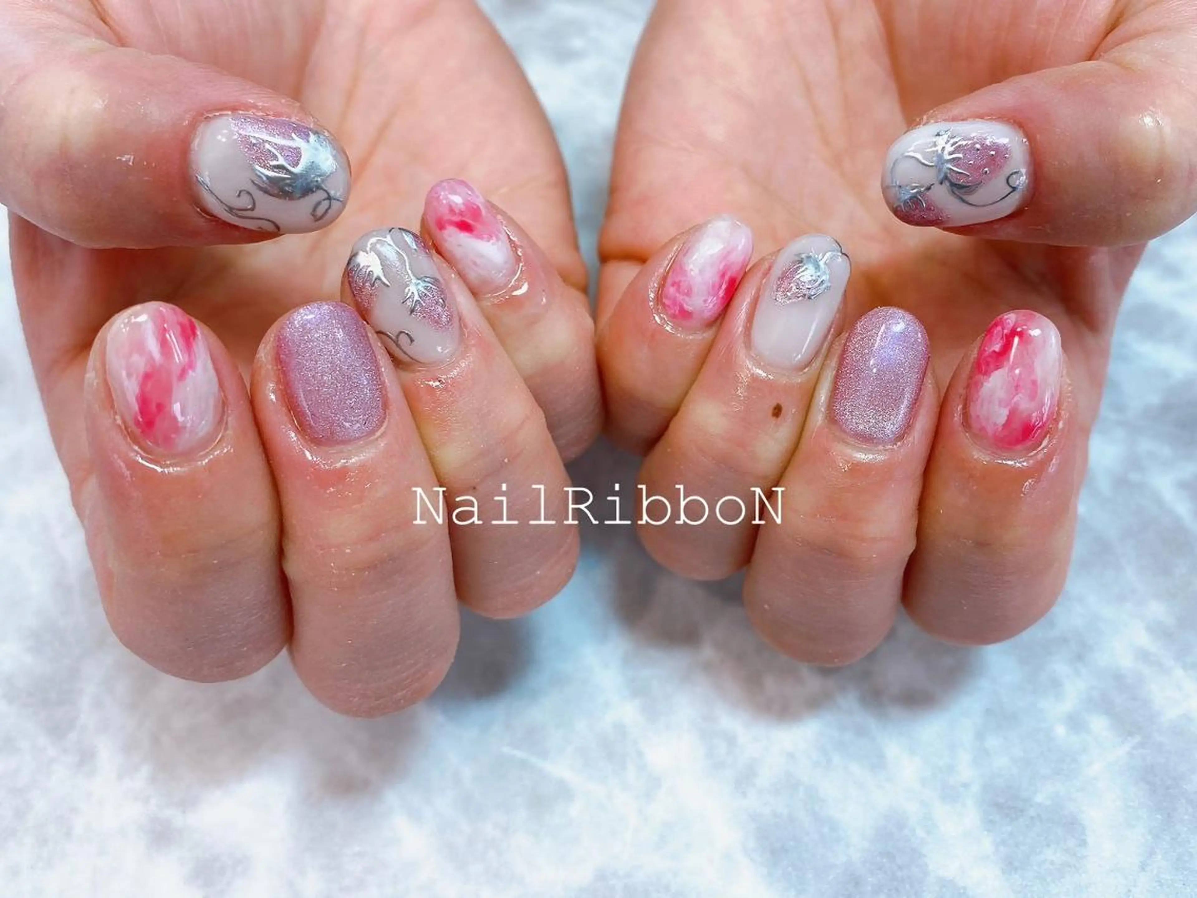 ネイル ネイルリボン 受付スタッフのマツエク・マツパデザイン