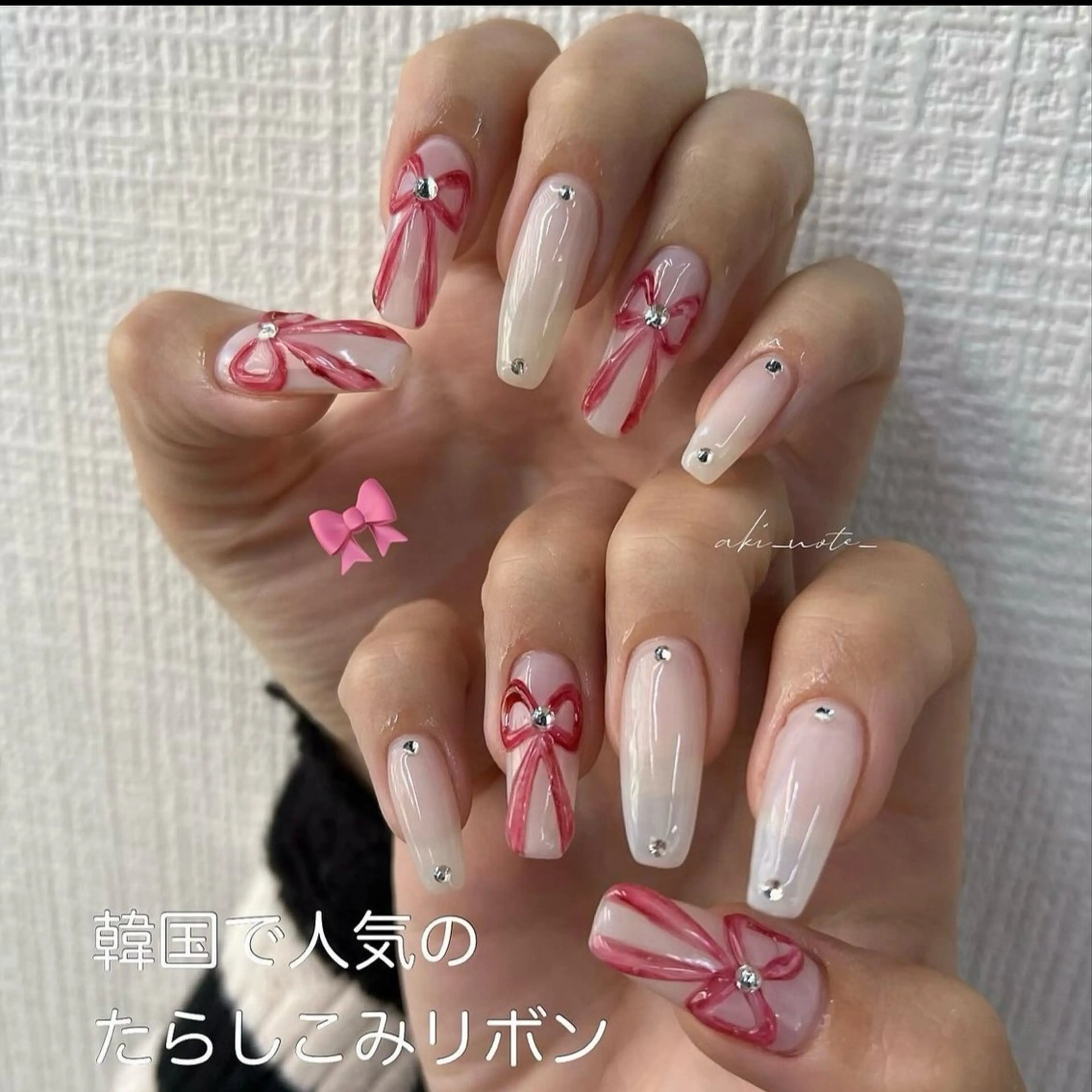 ネイル リボン バレンタイン 冬ネイル クリスマス ハンドネイル フットネイル GRANDE大須 栄/店長 aki🌙のネイルデザイン