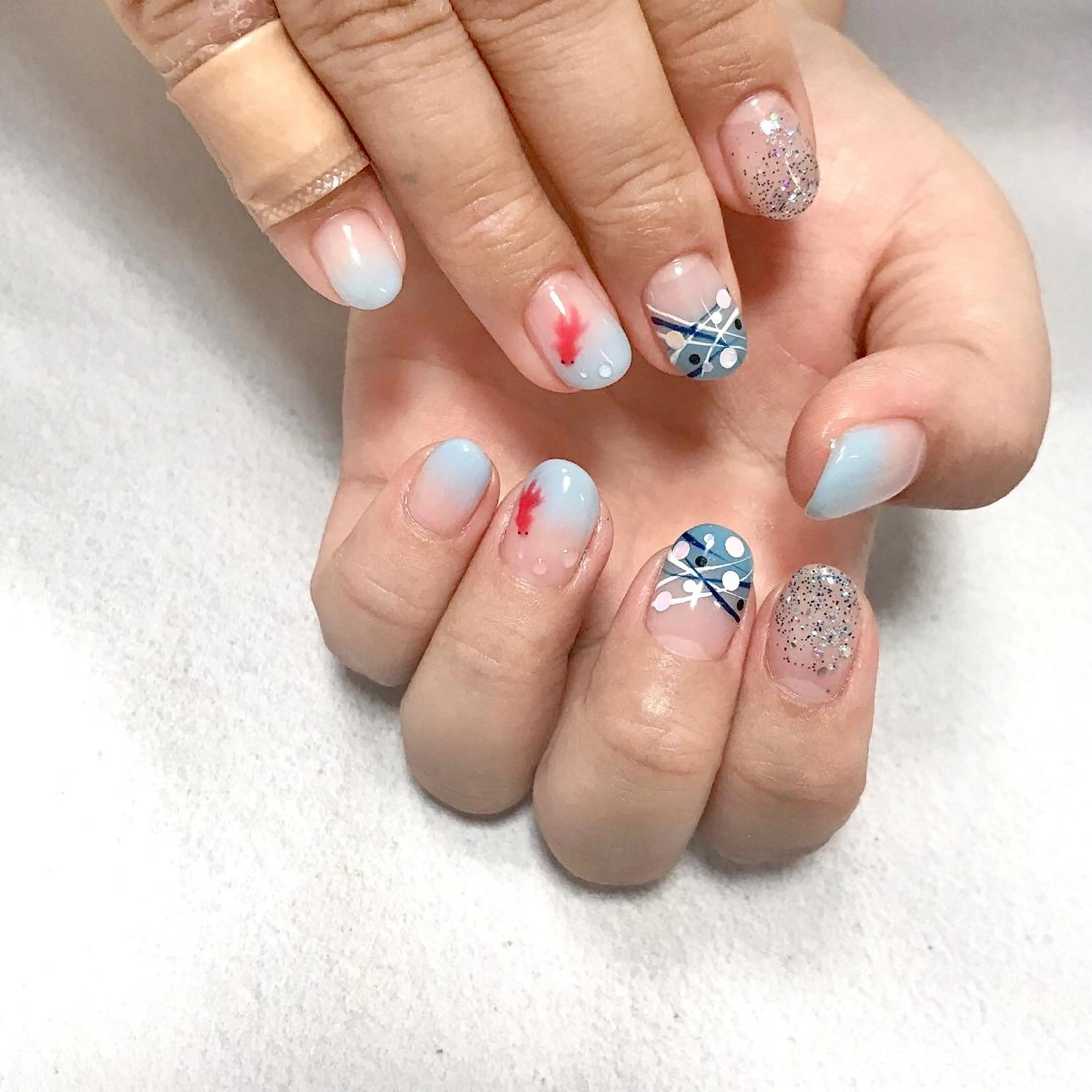 ネイル アートネイル ブルー グラデーション ラメ(グリッター) 夏ネイル ステラ marikominoのネイルデザイン