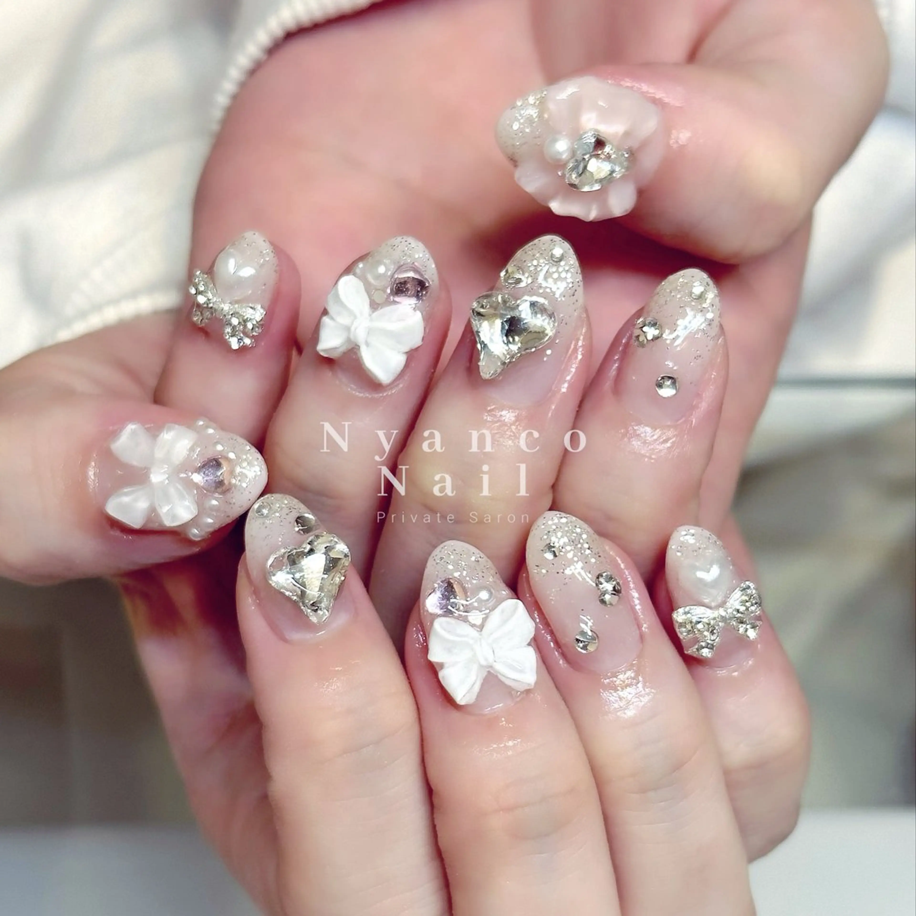 ネイル ジェルネイル ハート キラキラネイル ピンク リボン Nyanco Nailのネイルデザイン