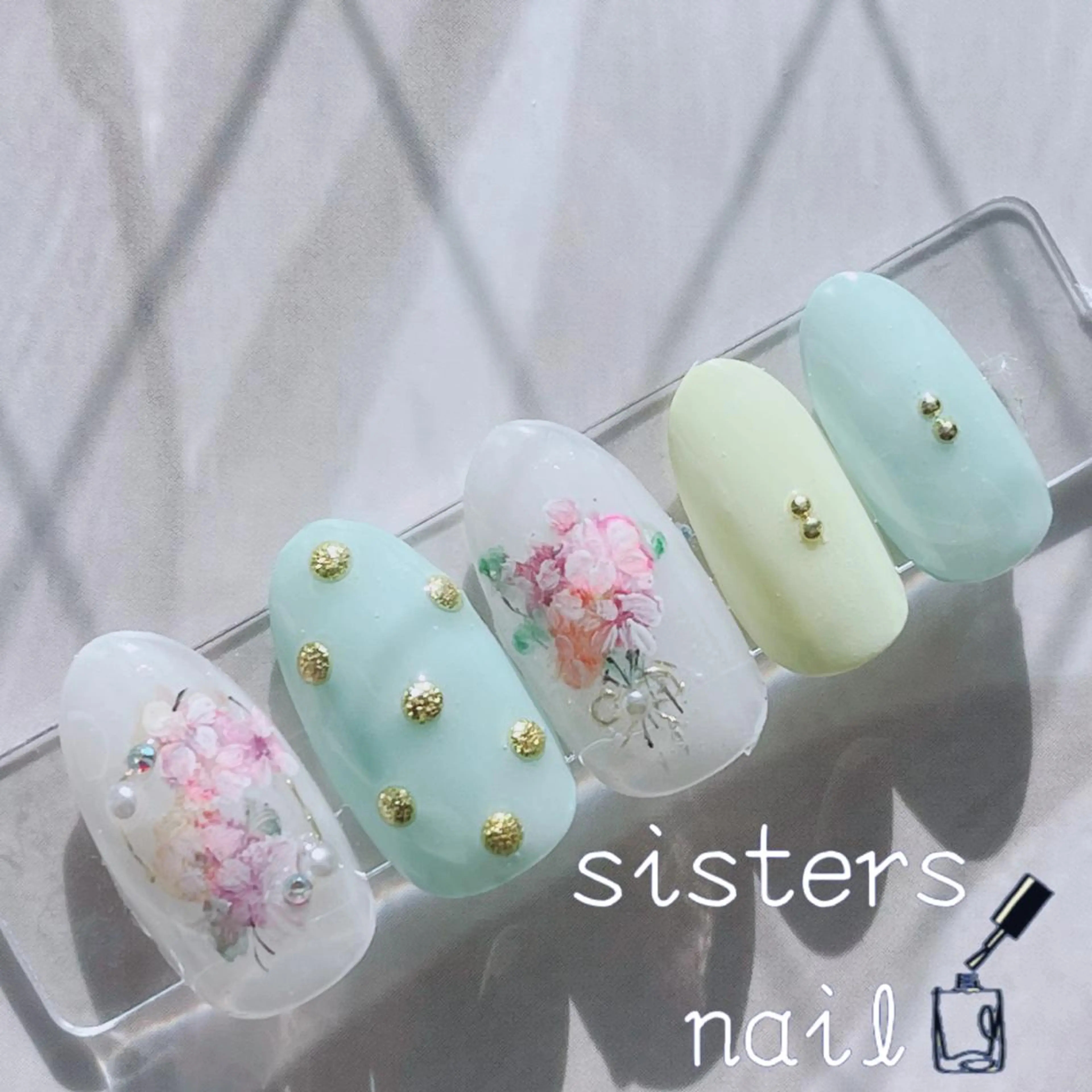 ネイル アートネイル フラワーネイル キラキラネイル 春ネイル ハンドネイル ハンドケア sisters nail.fのネイルデザイン