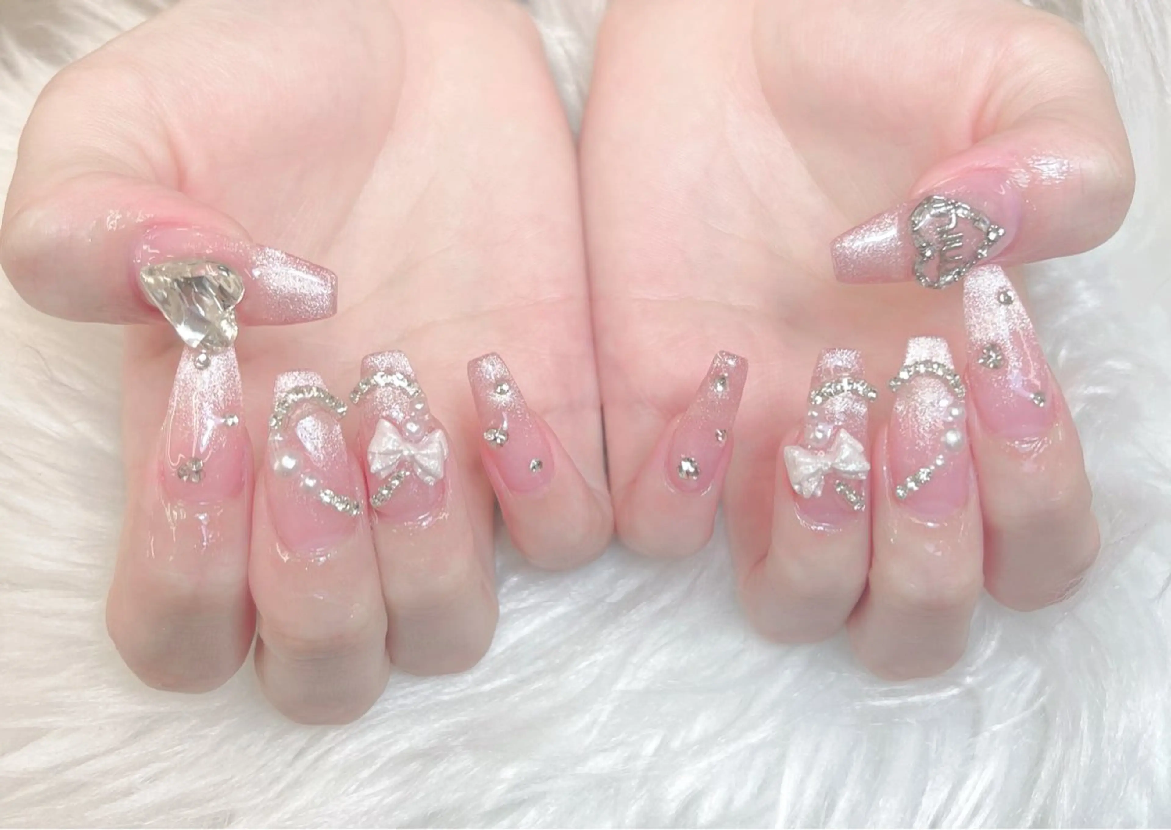 ネイル 成人式 ロングネイル マグネットネイル 大理石ネイル(マーブル) リボン ハンドネイル Amee Nailsalonのネイルデザイン