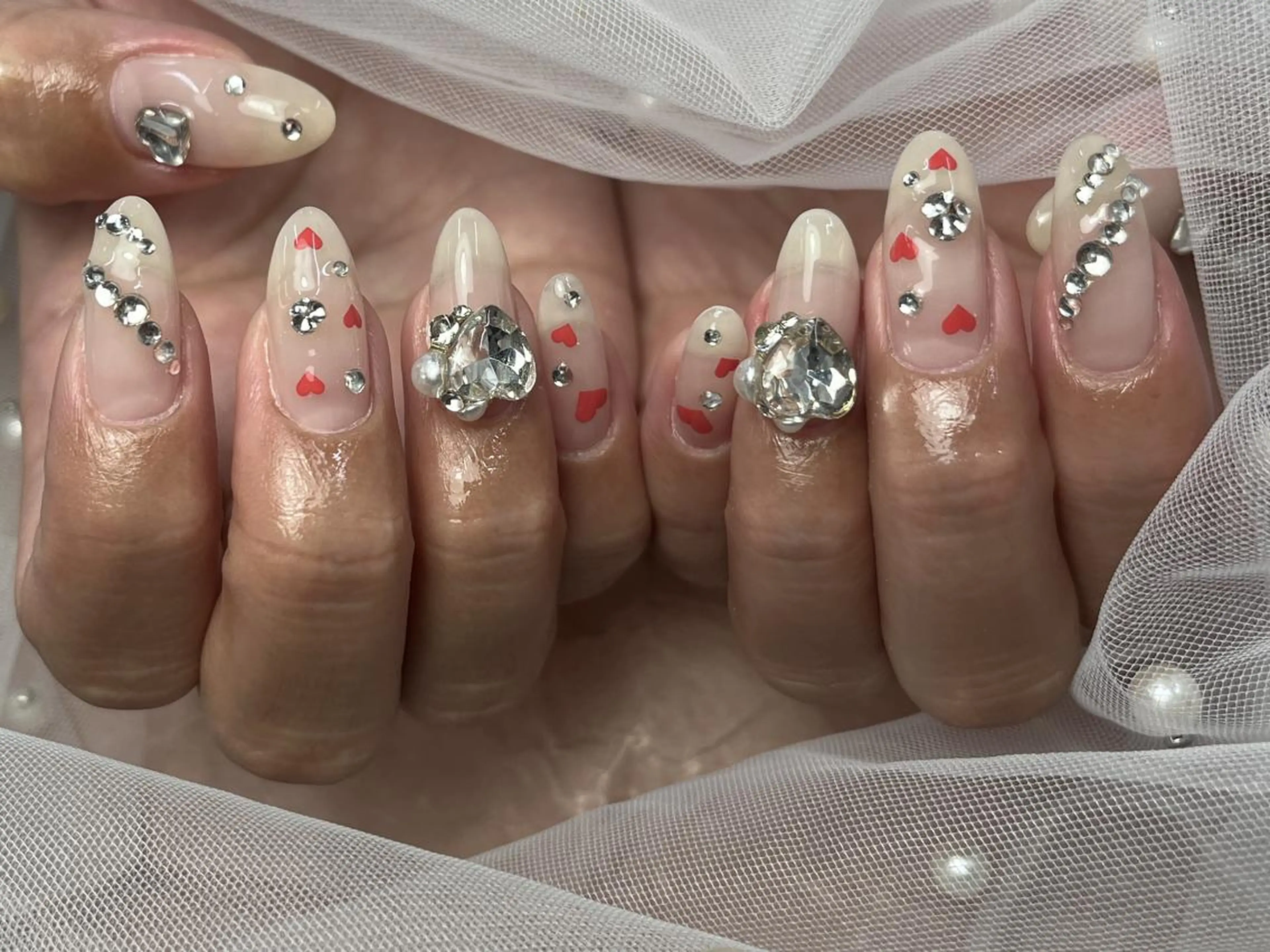 ネイル クリアネイル ゴージャス ハート キラキラネイル ストーンネイル ハンドネイル ToliyDeliy Nail Salonのネイルデザイン