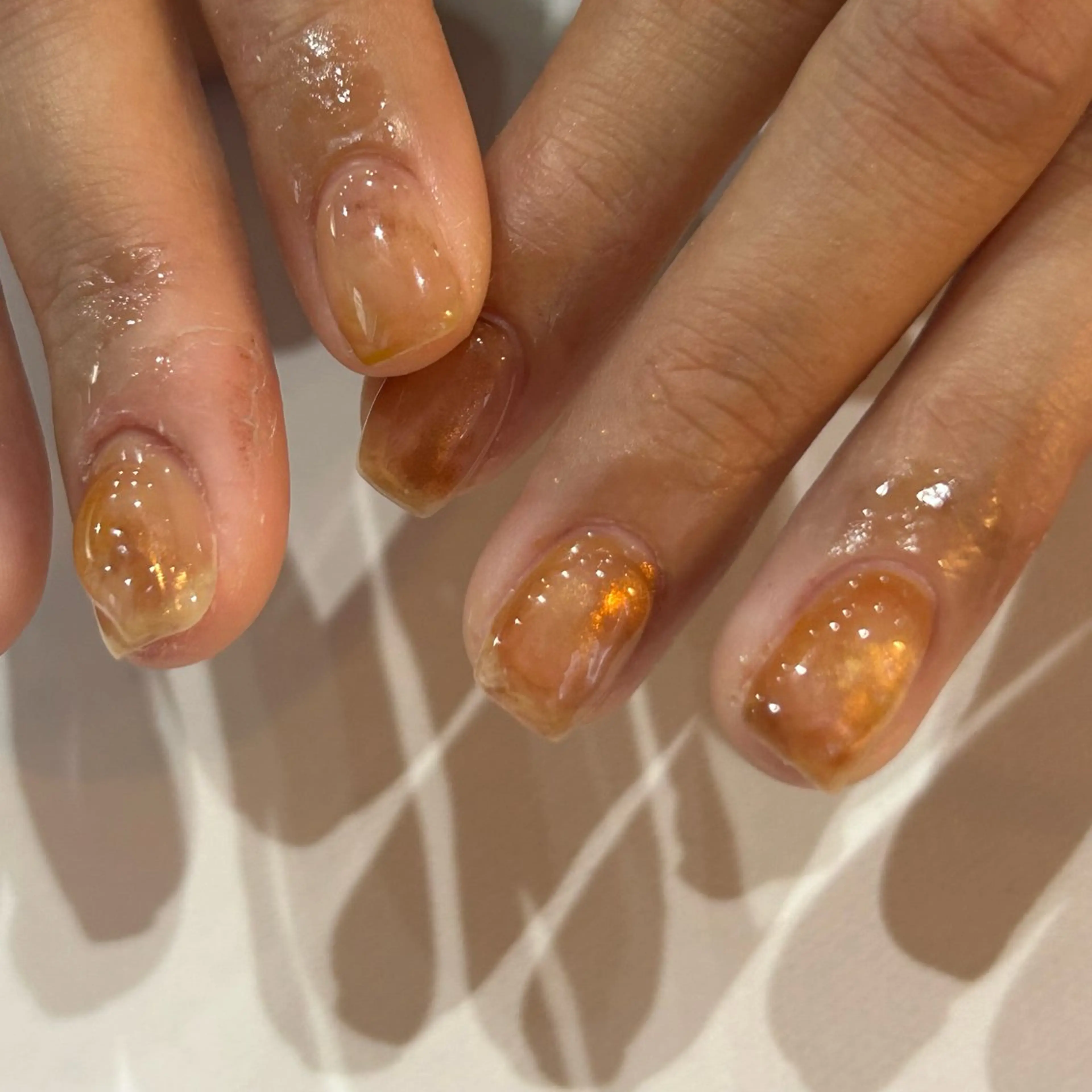 ネイル ブラウン 氷ネイル・うるうるネイル オレンジ ハンドネイル Etel atelier.のネイルデザイン