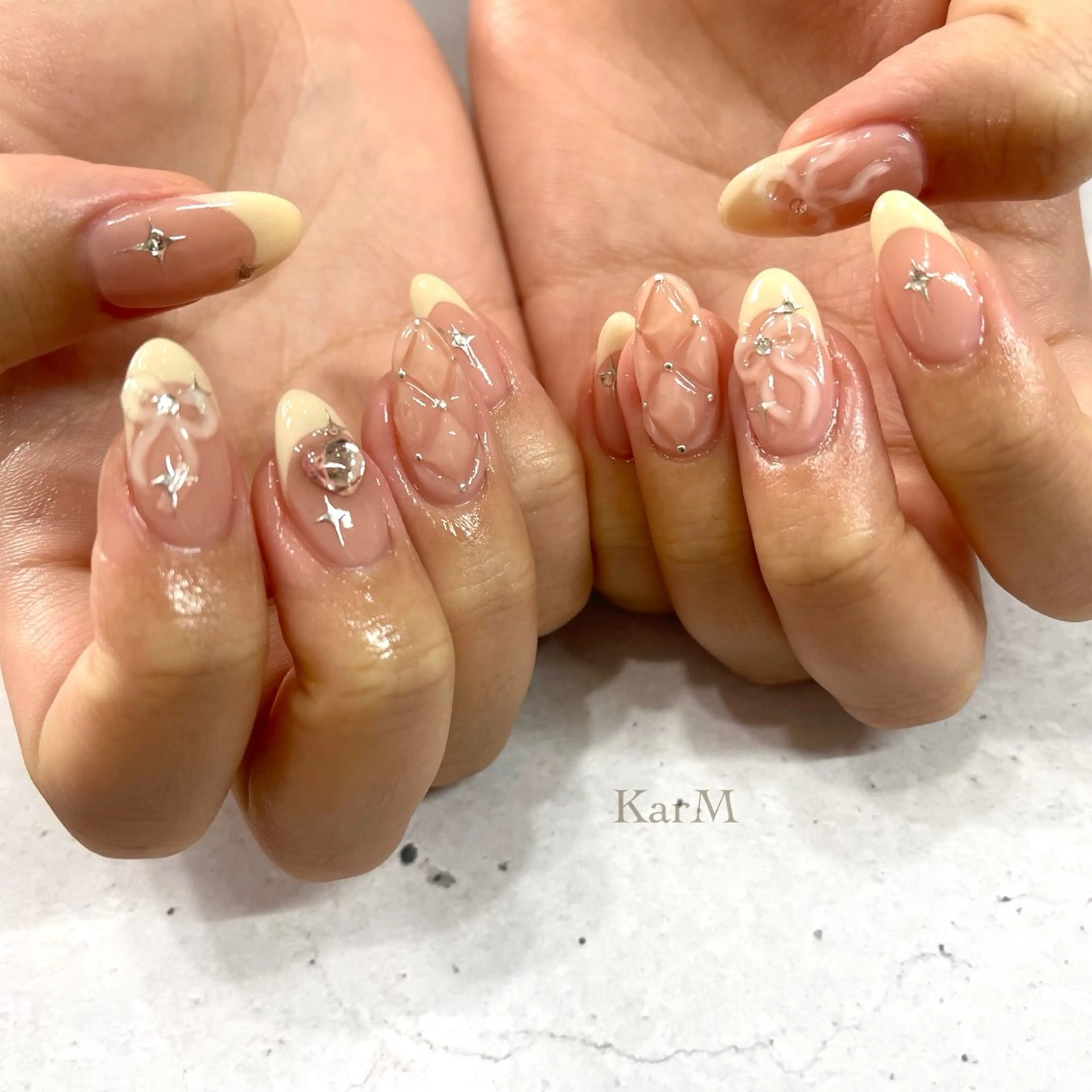 ネイル フレンチネイル 韓国ネイル ニュアンスネイル リボン 春ネイル ハンドネイル ogino karinのネイルデザイン