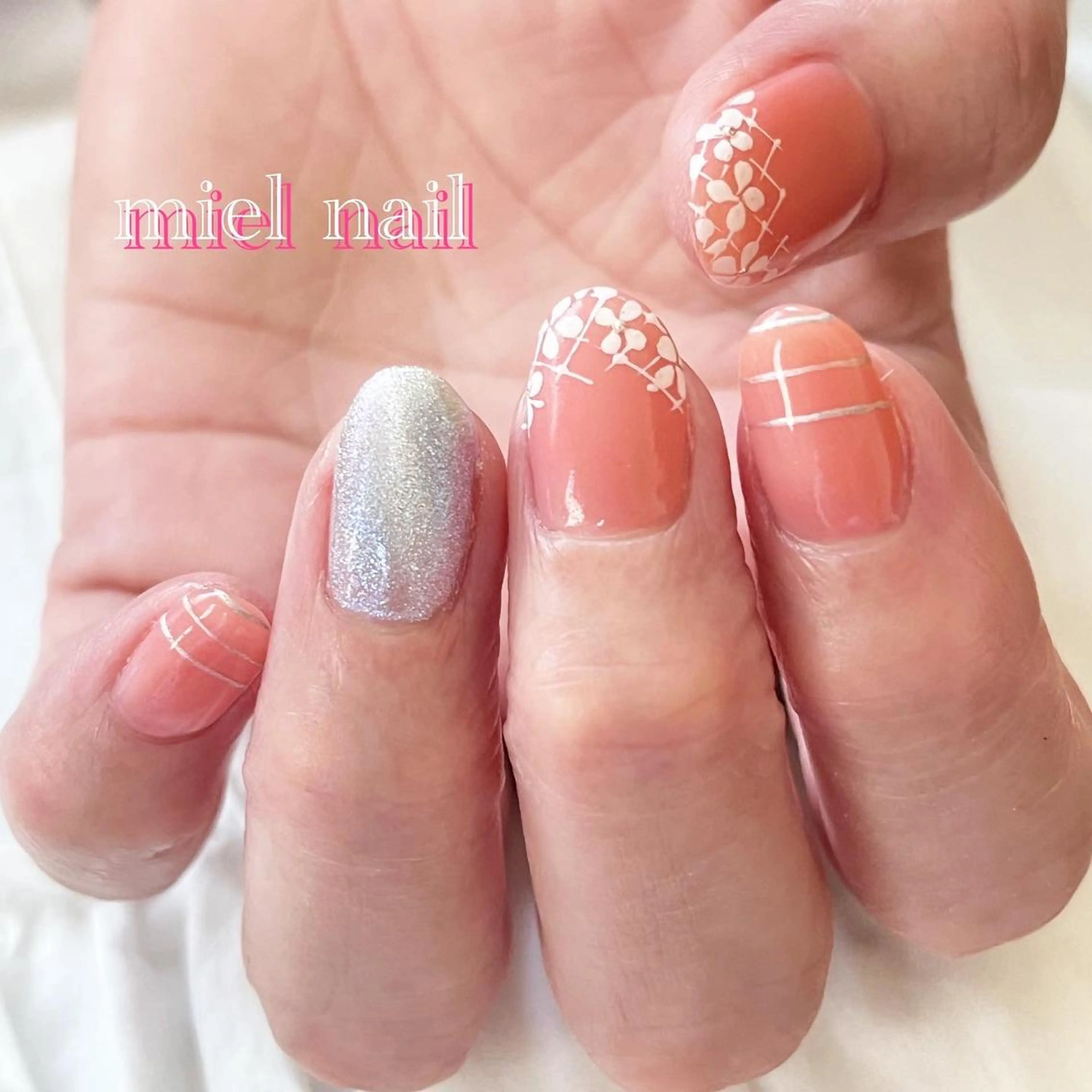 ネイル オレンジ ピンク 春ネイル ハンドネイル miel nailのネイルデザイン