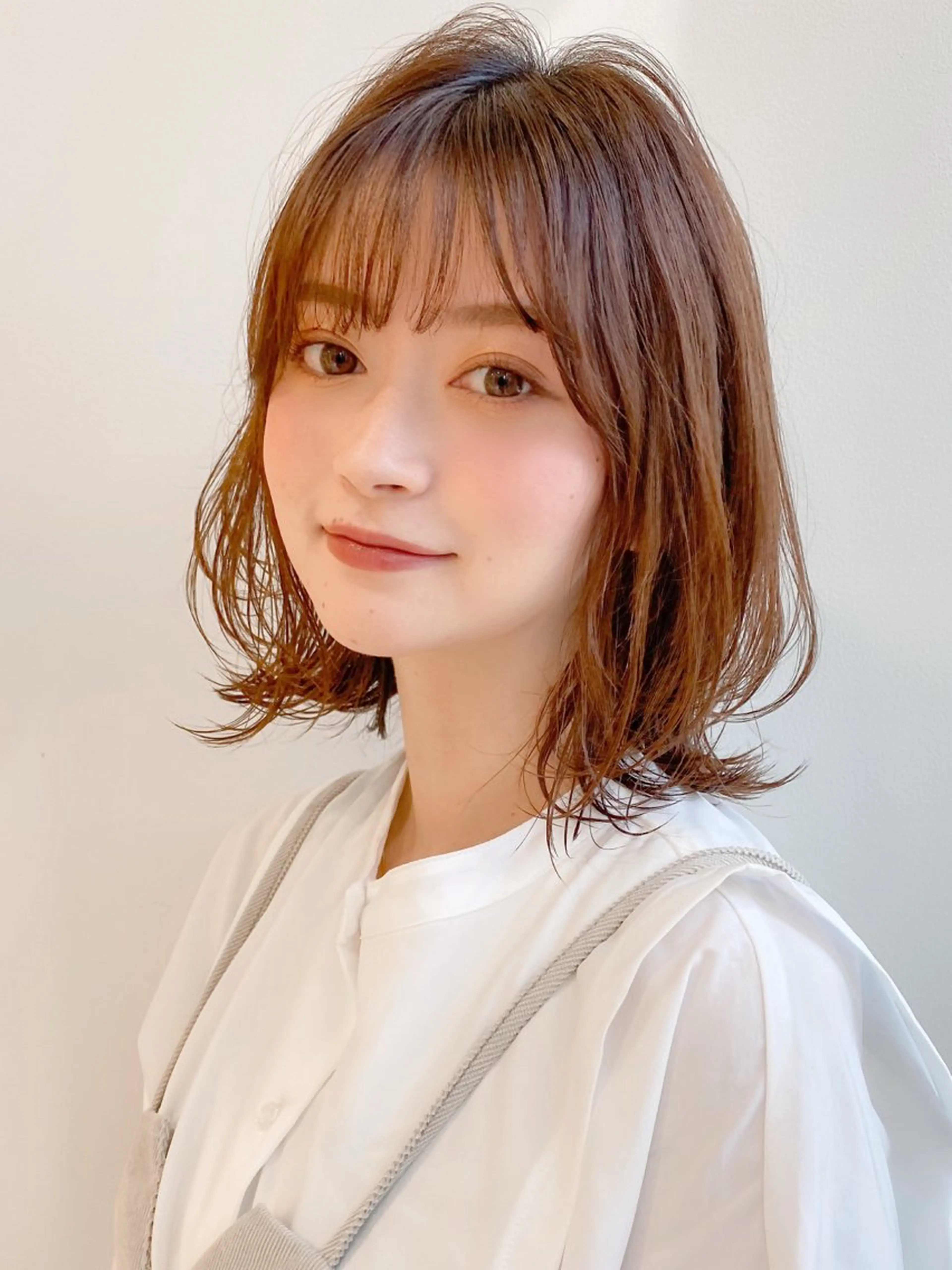 ミディアム くびれヘア レイヤーカット 佐藤 侑哉のヘアスタイル