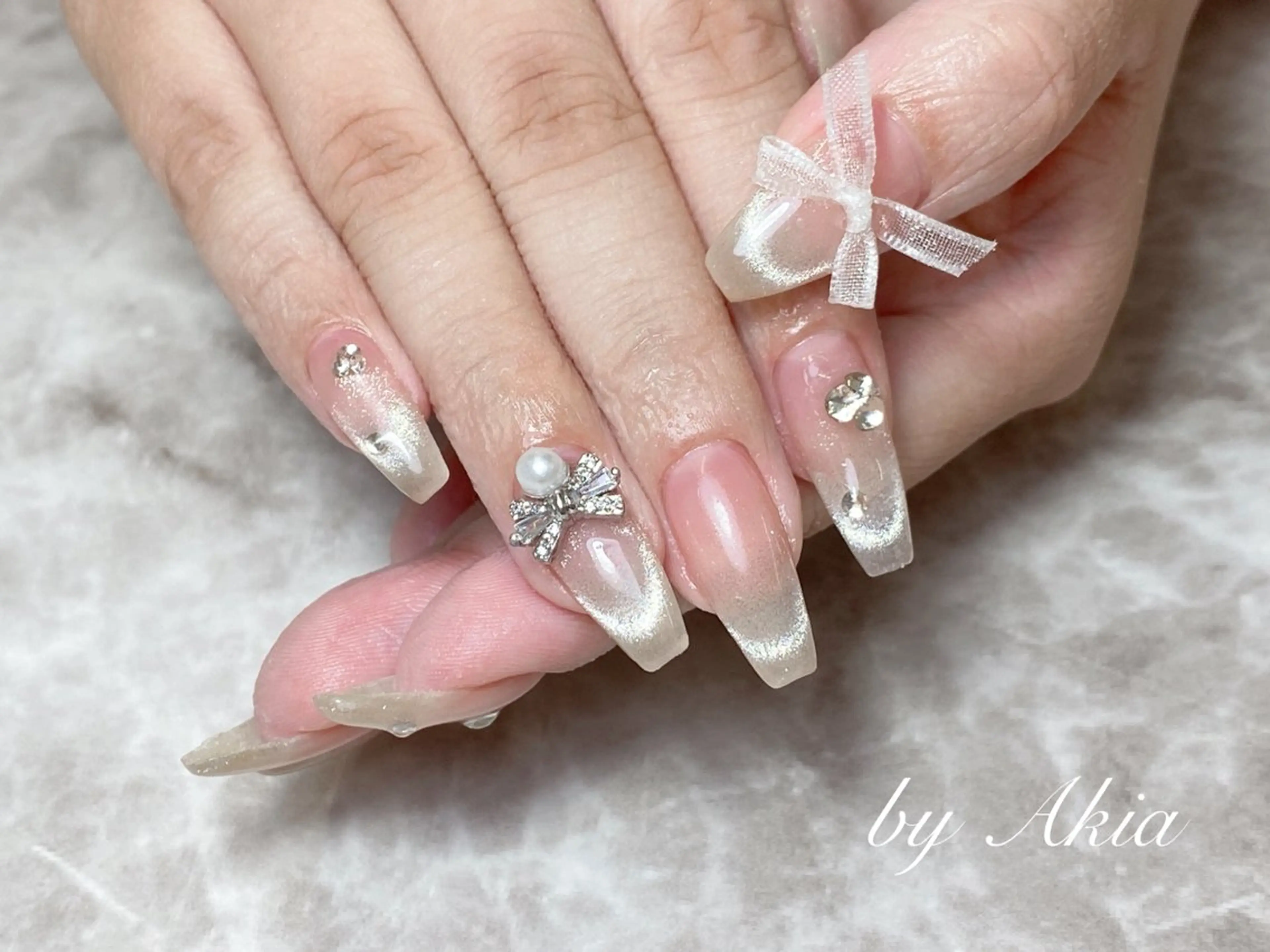 ネイル 持ち込み リボン ハンドネイル ハンドケア 閨匠ビューティサロン 銀座店のネイルデザイン