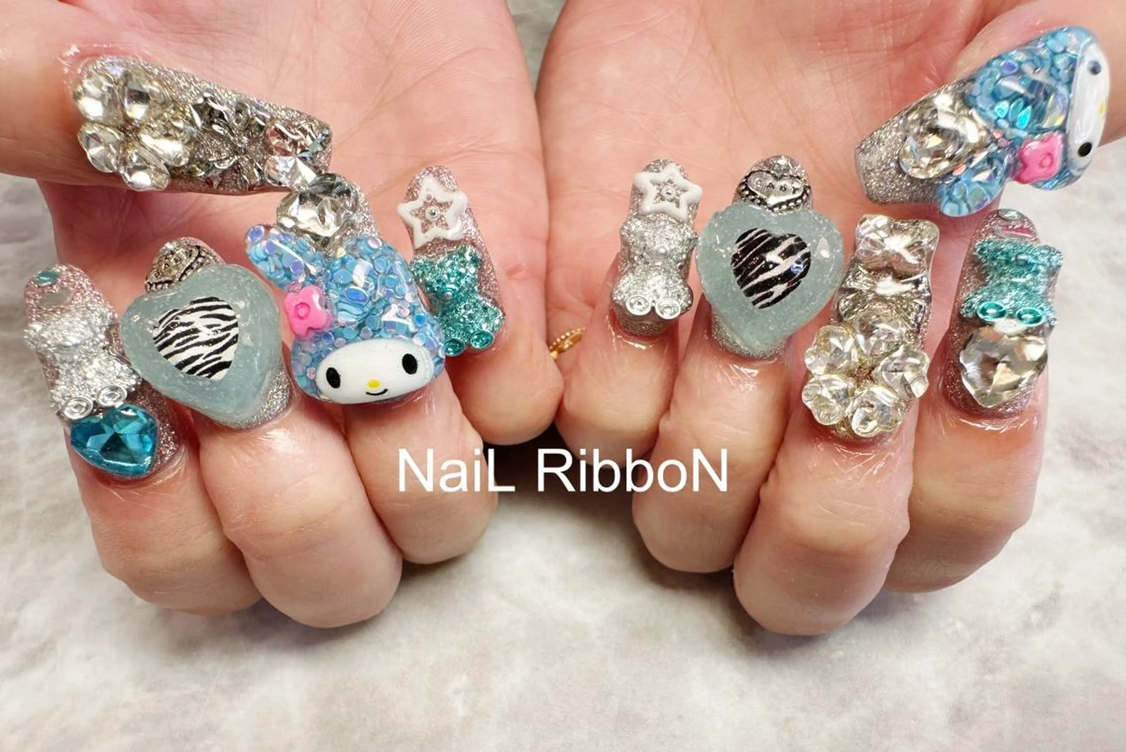 ネイル ネイルリボン 受付スタッフのマツエク・マツパデザイン