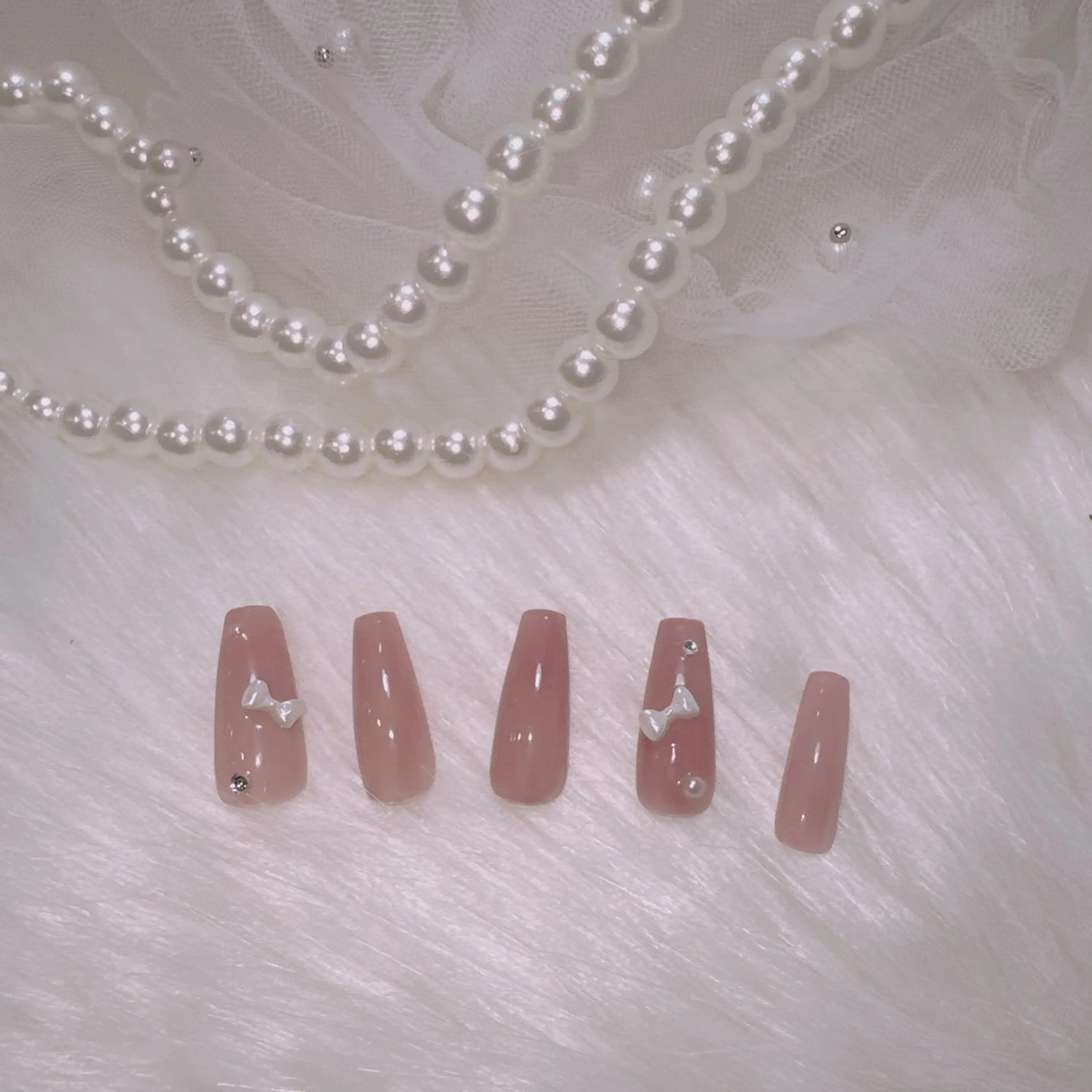 ネイル ピンク リボン ハンドネイル emu 心斎橋店 nanohaのネイルデザイン