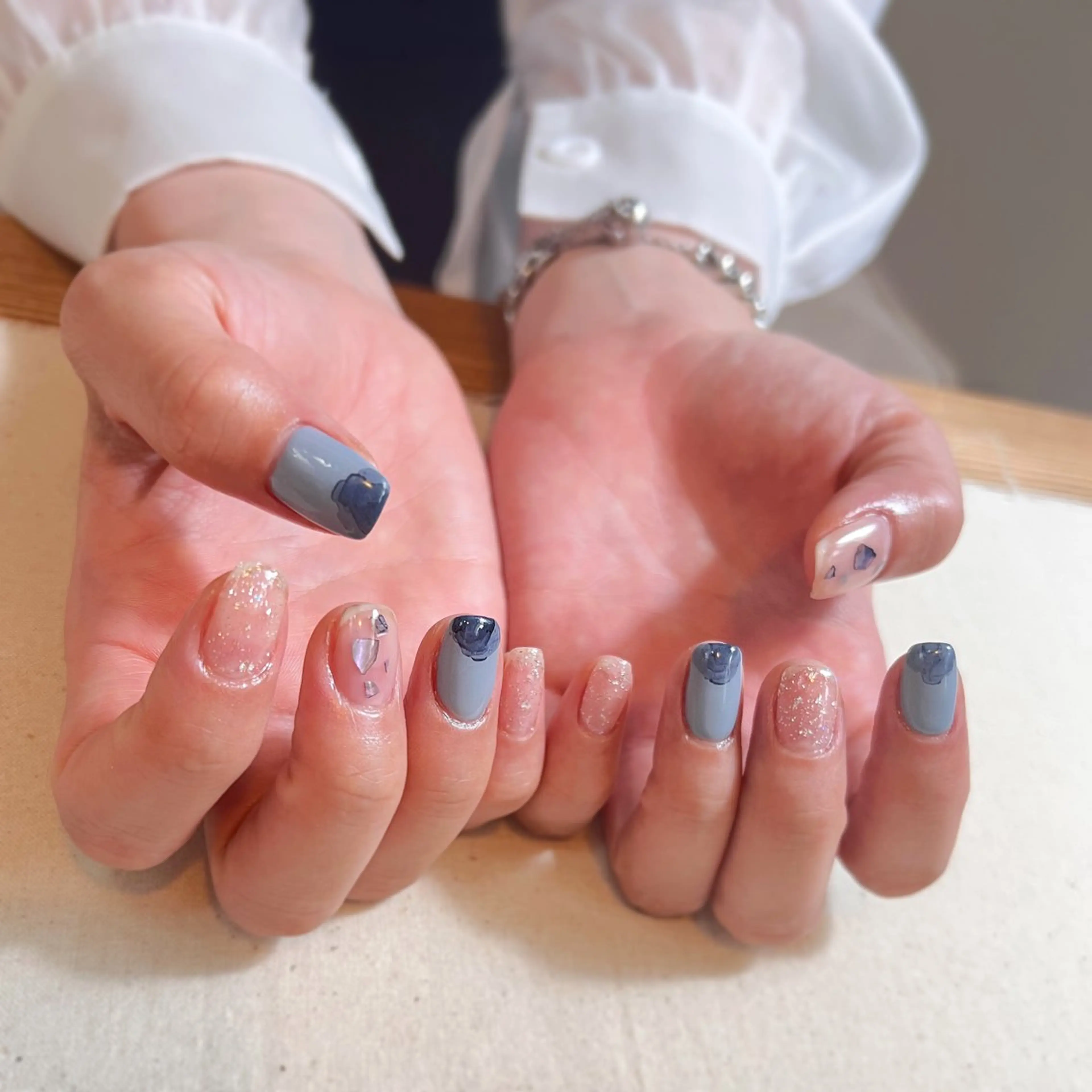 ネイル ブルー クリアネイル ラメ(グリッター) 水色 ニュアンスネイル pointillé .ayaのネイルデザイン