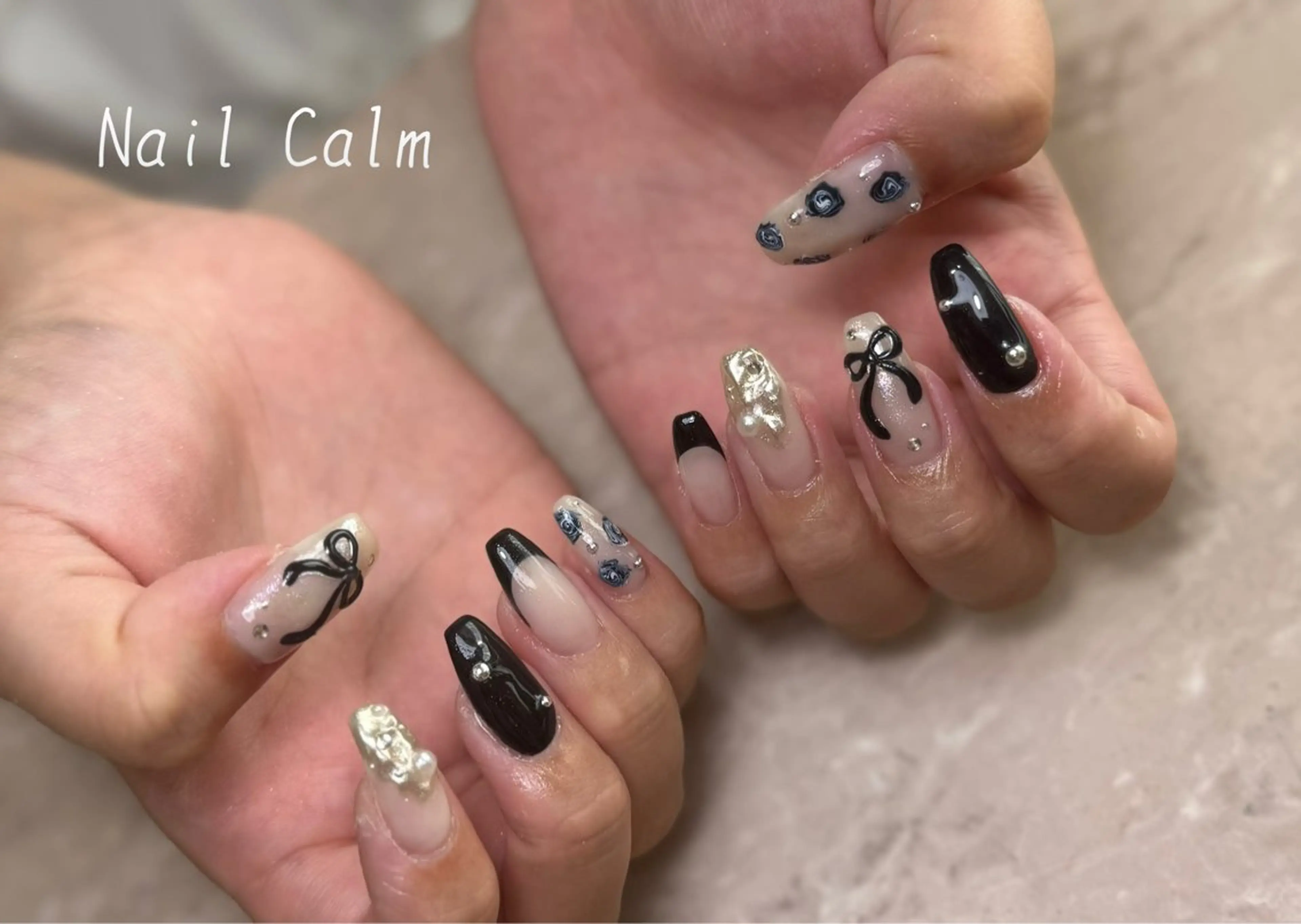 ネイル リボン ハンドネイル Nail Calm所属・プライベートサロン Calmのネイルデザイン