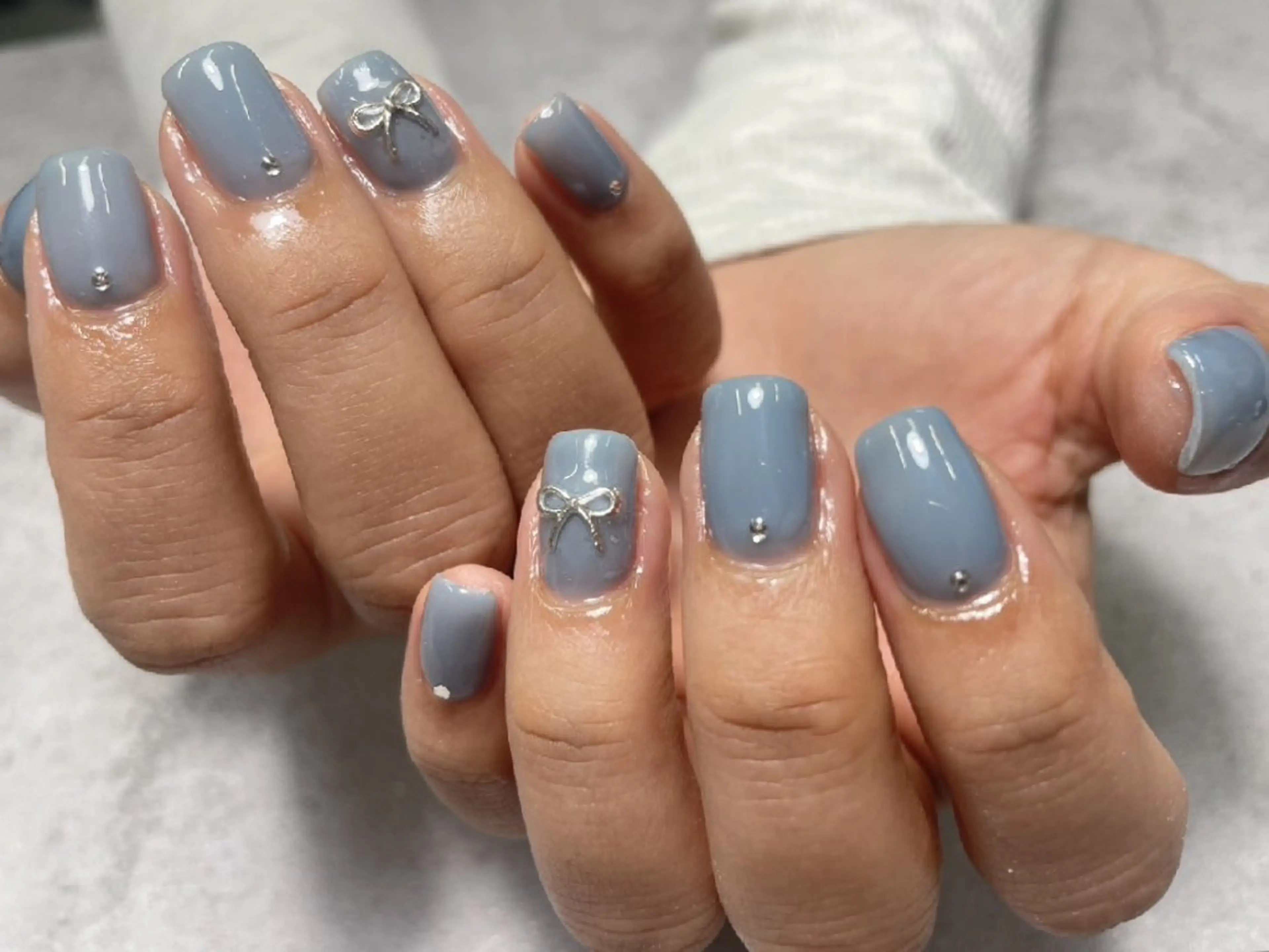 ネイル ワンカラーネイル リボン K+1所属・k+1💅🏻 miyukiのネイルデザイン