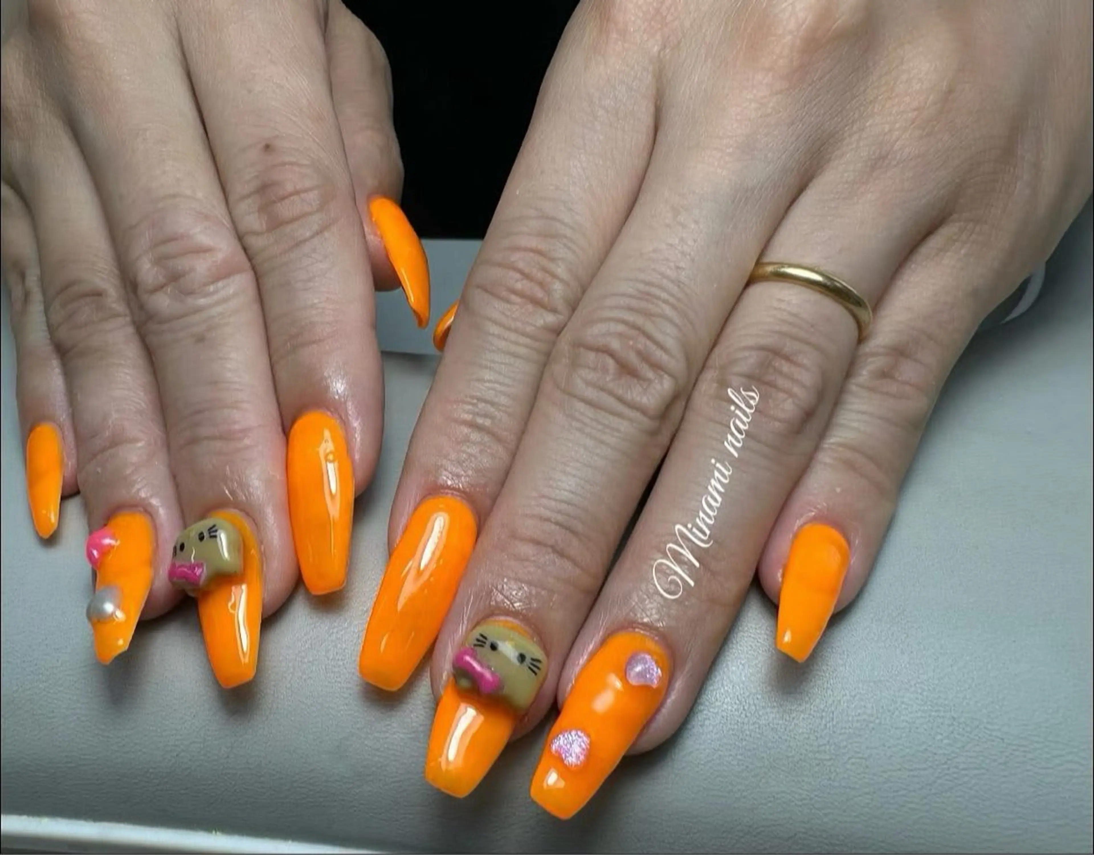 ネイル キラキラネイル オレンジ ハンドネイル minamiネイル トユイのネイルデザイン