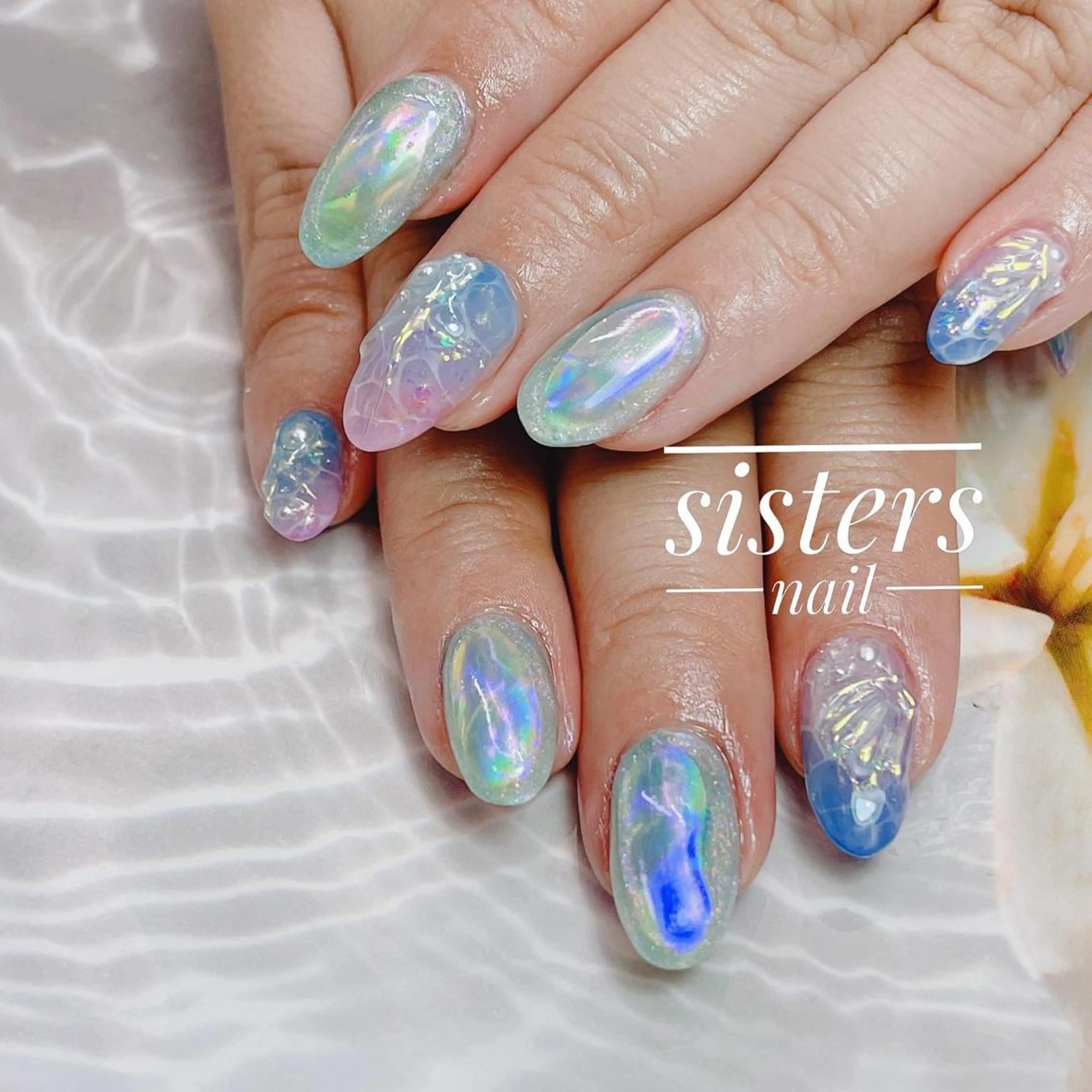 ネイル アートネイル オーロラネイル ブルー 氷ネイル・うるうるネイル キラキラネイル sisters nail.fのネイルデザイン