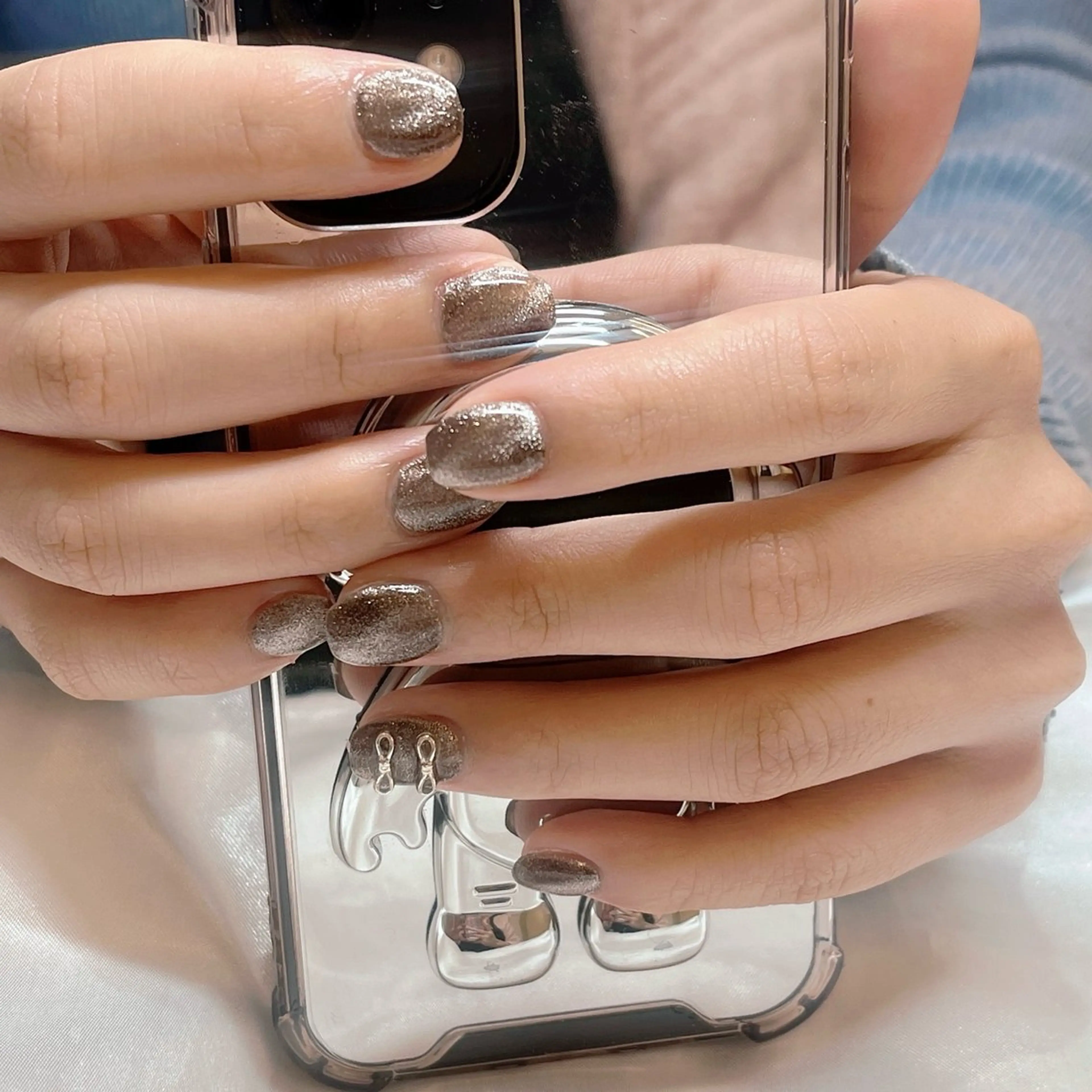 ネイル ブラウン フラッシュネイル ジェルネイル マグネットネイル ワンカラーネイル nail salon HERA所属・HERA 小橋川のネイルデザイン