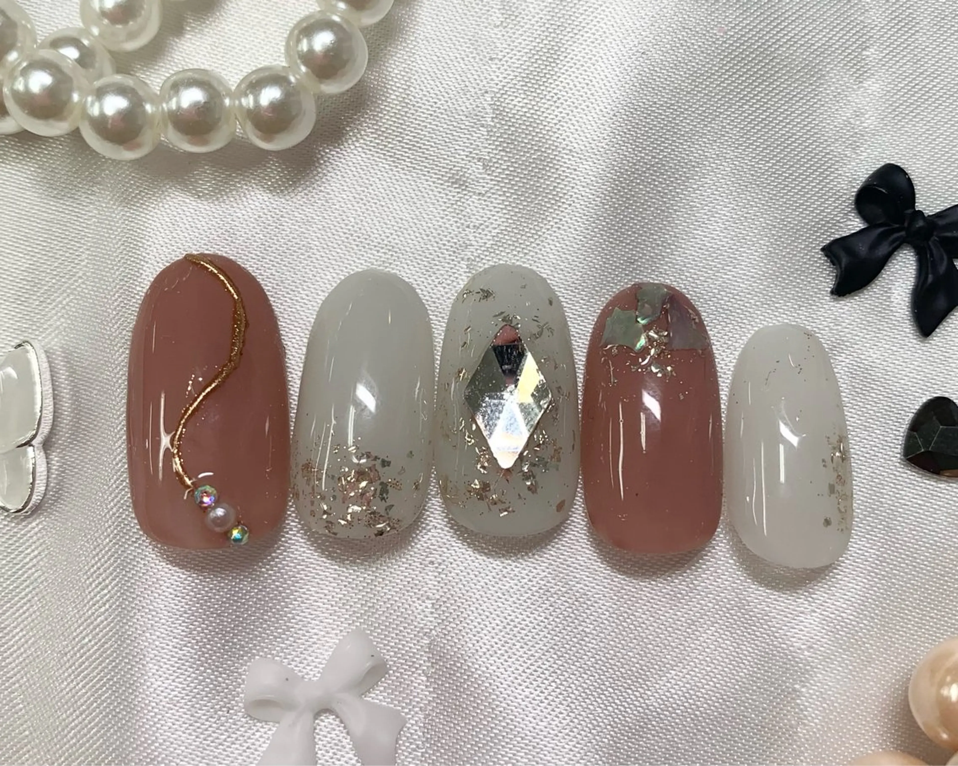 ネイル ハンドネイル ネイルPetit Ribbonのネイルデザイン